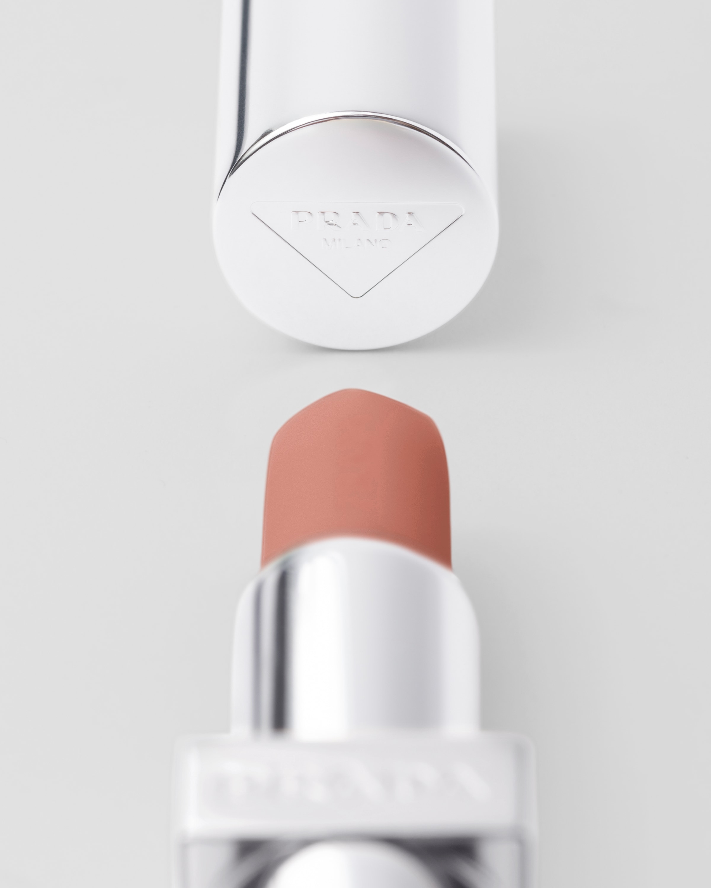U011 - NOISETTE Prada Optimizing Care lip balm - U011