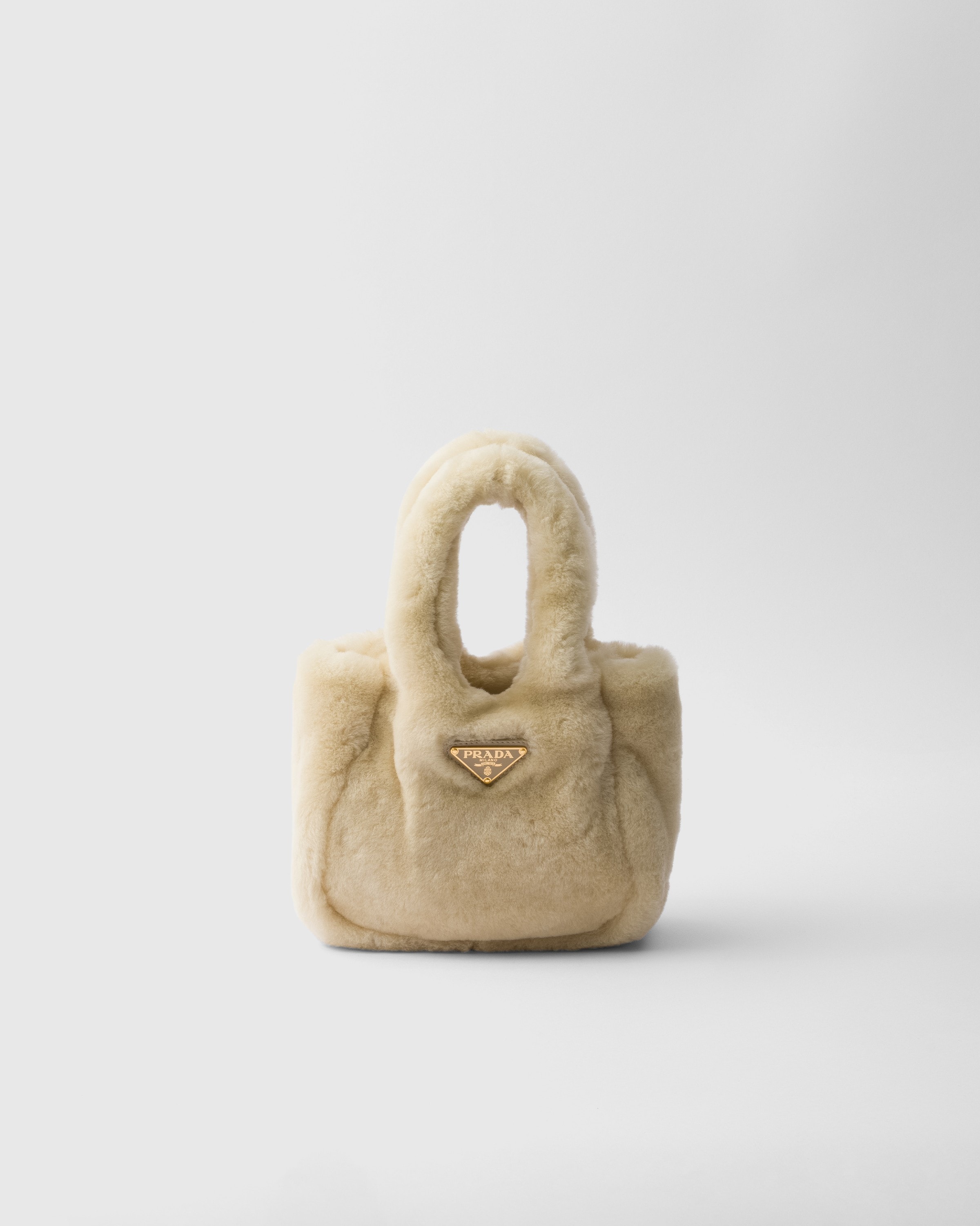 Shop Prada Shearling Mini Handbag In Ecru