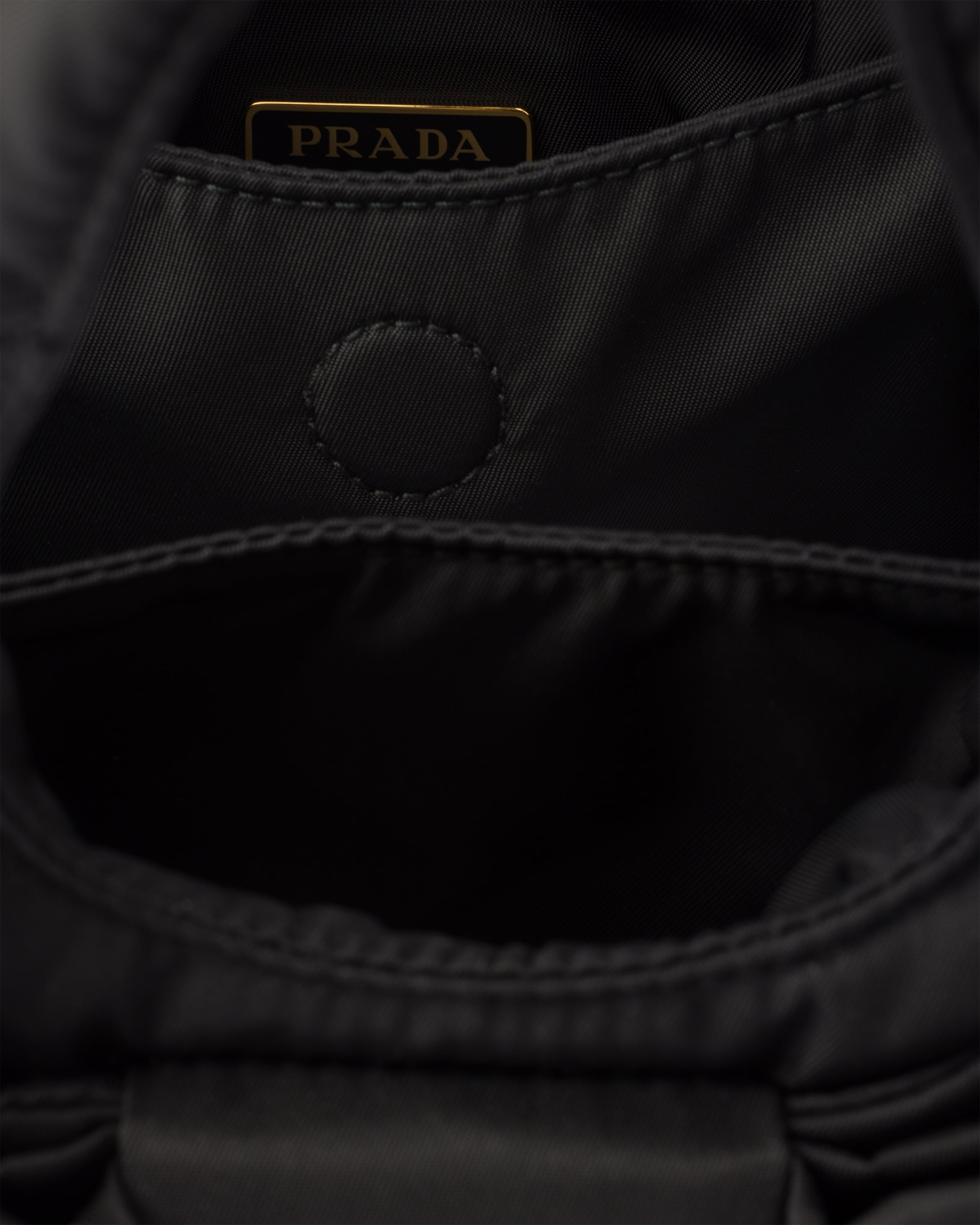 Padded Re-Nylon mini-bag with bow