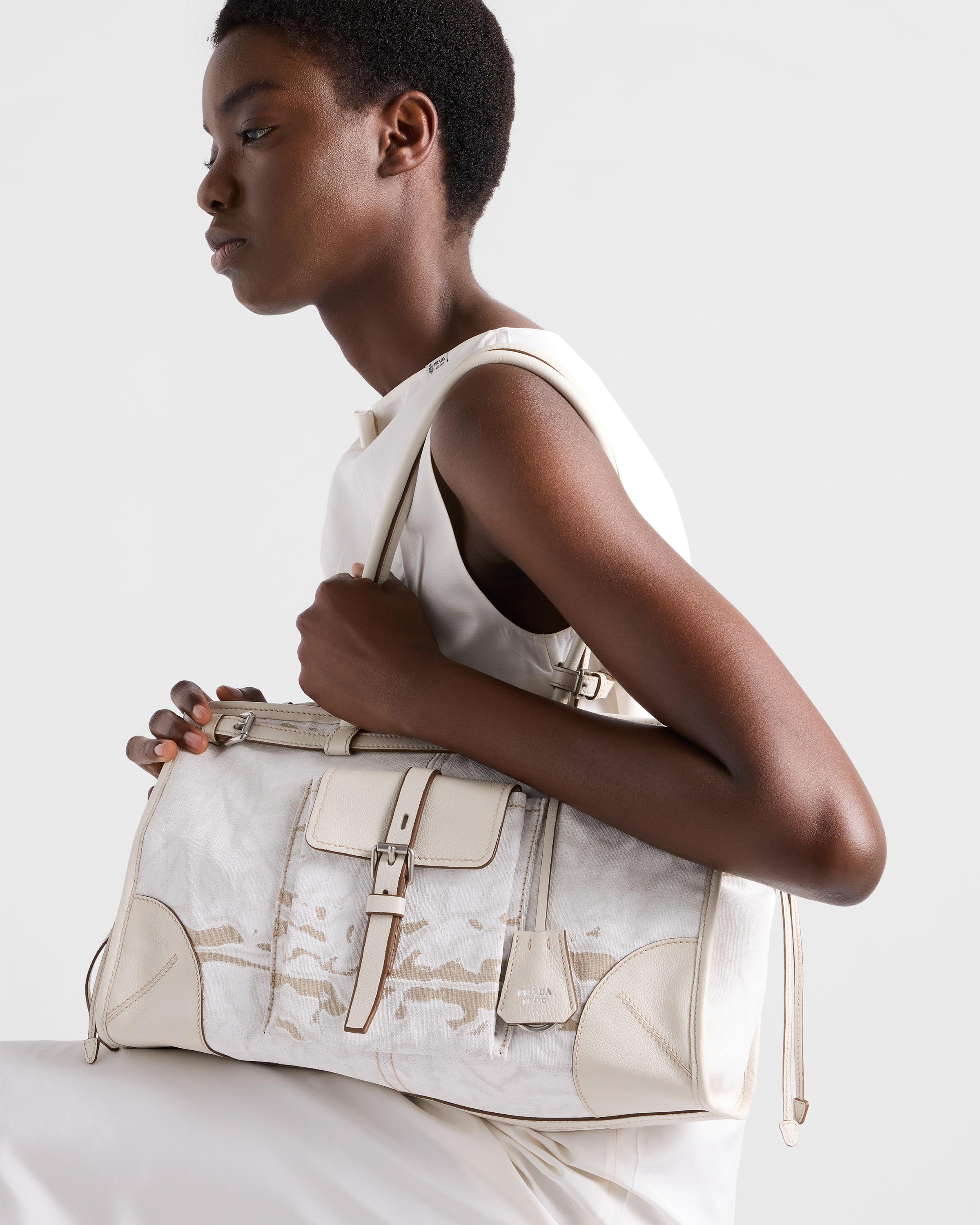 White Prada Bonnie large printed linen and leather handbag | PRADA