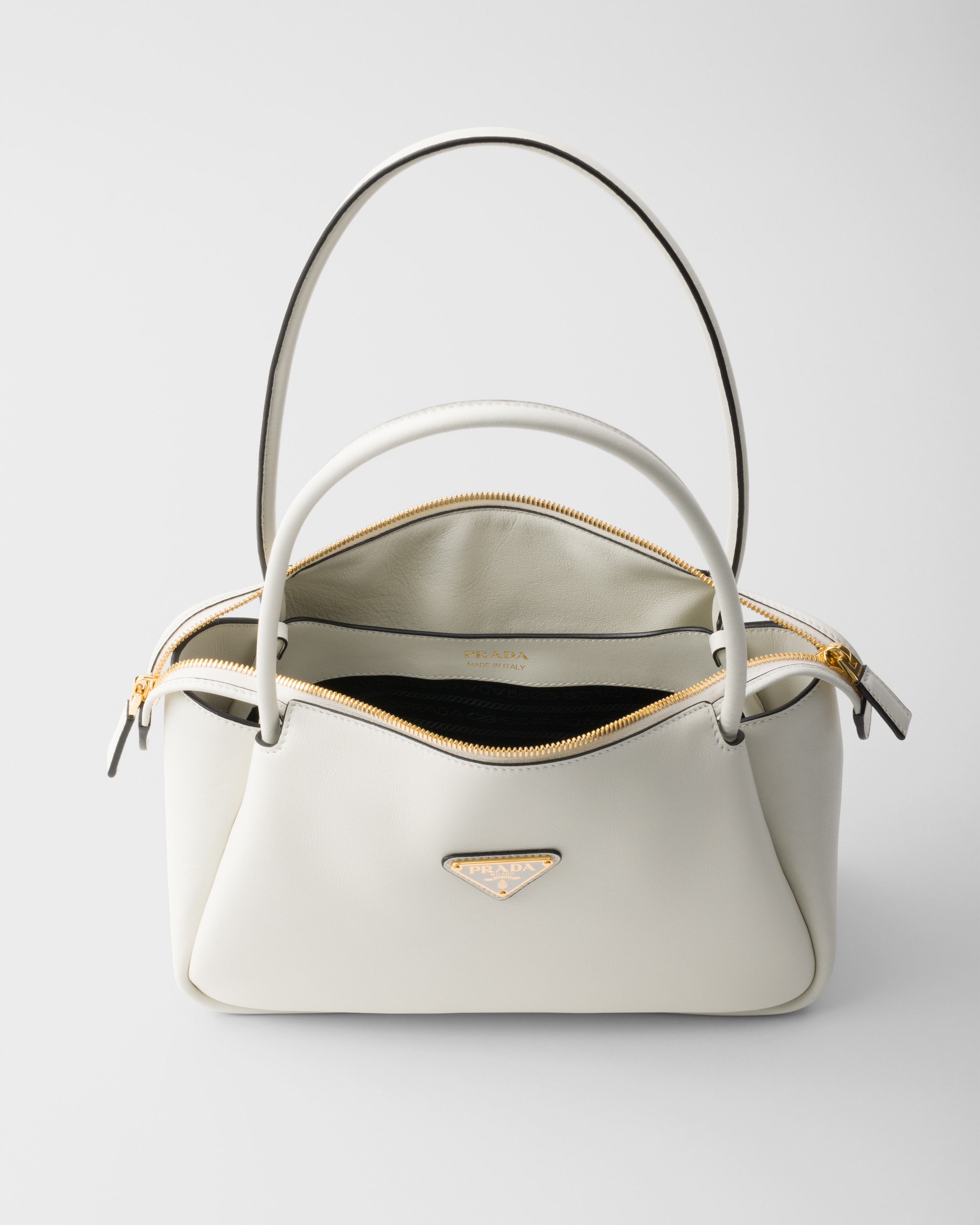 Prada Re-nylon And Leather Medium Top-handle Bag With Padlock In White