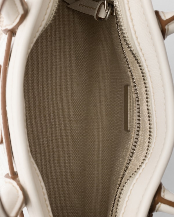 Prada Bonnie kleine Tasche aus bedrucktem Leinen und Leder - Weiss Prada Bonnie kleine Tasche aus bedrucktem Leinen und Leder - Weiss