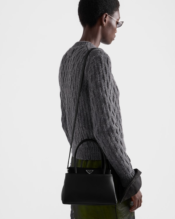 Prada Passage small leather bag with Re-Nylon flap - Black Prada Passage small leather bag with Re-Nylon flap - Black