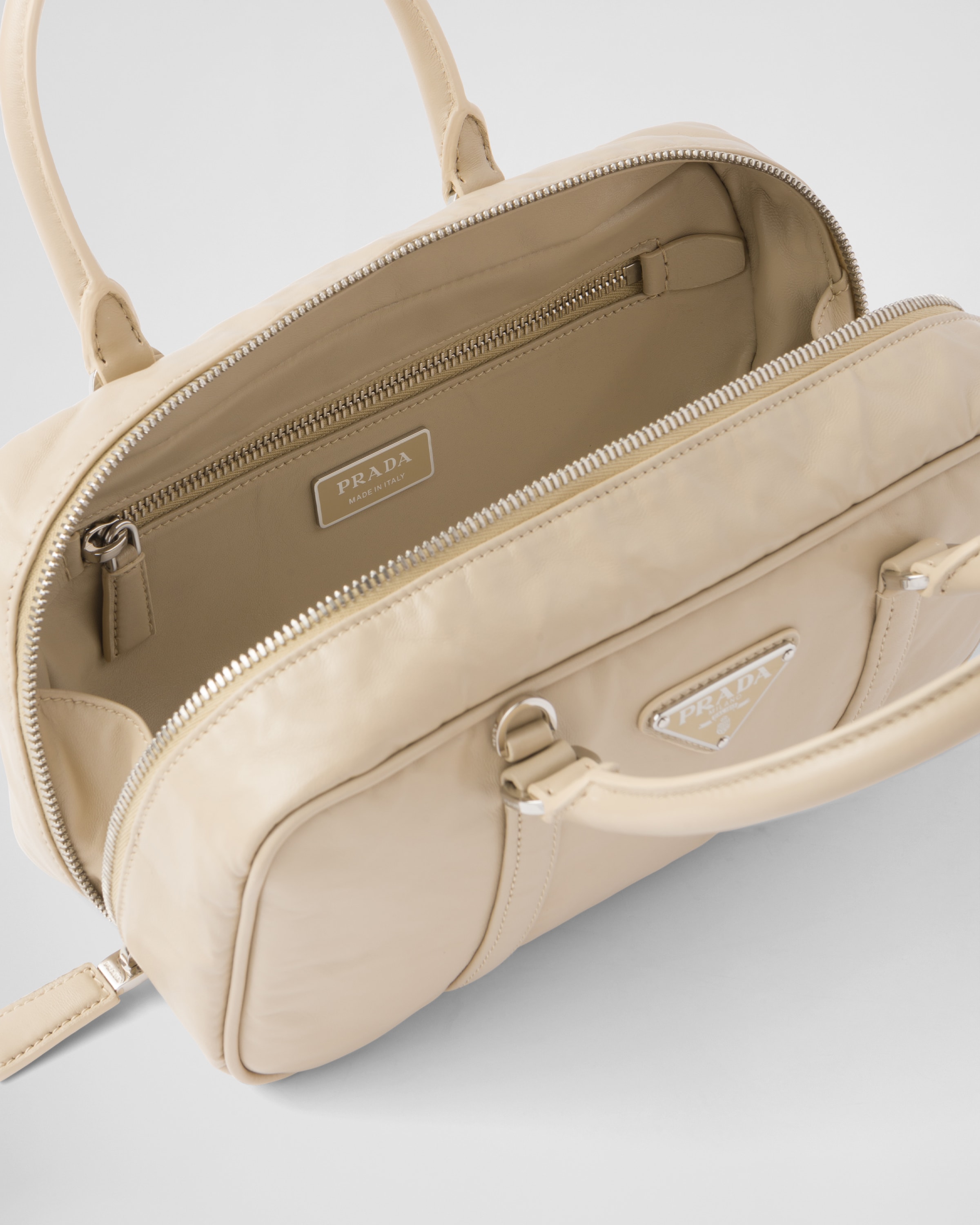 Desert Beige Small antique nappa leather top handle bag | Prada