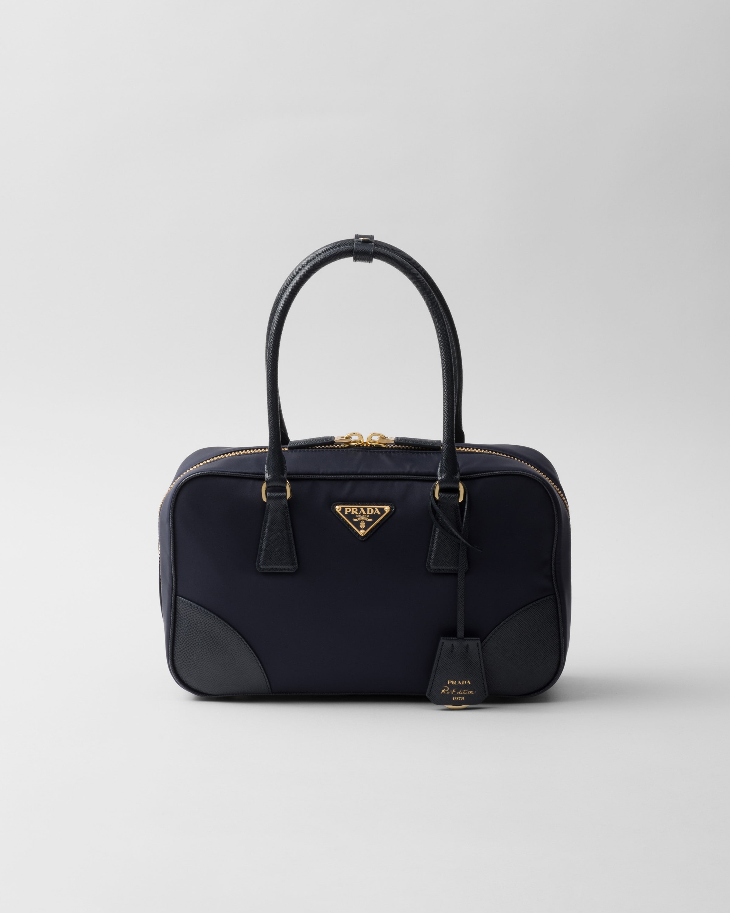 Prada Re-edition 1978 Medium Re-nylon And Saffiano Leather Two-handle Bag In Blau