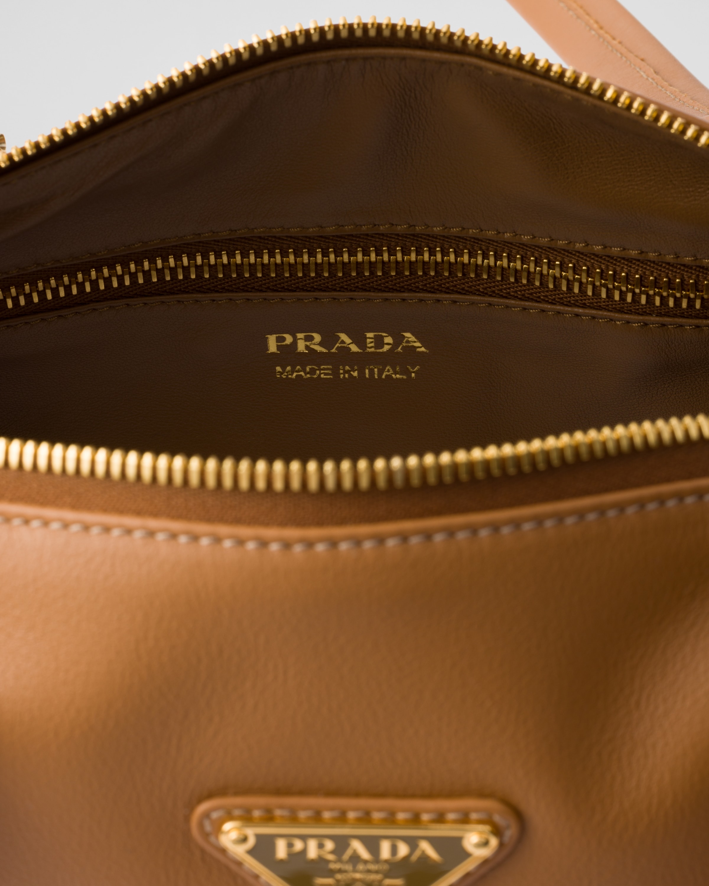 Prada Re-nylon And Leather Medium Top-handle Bag With Padlock In Karamell