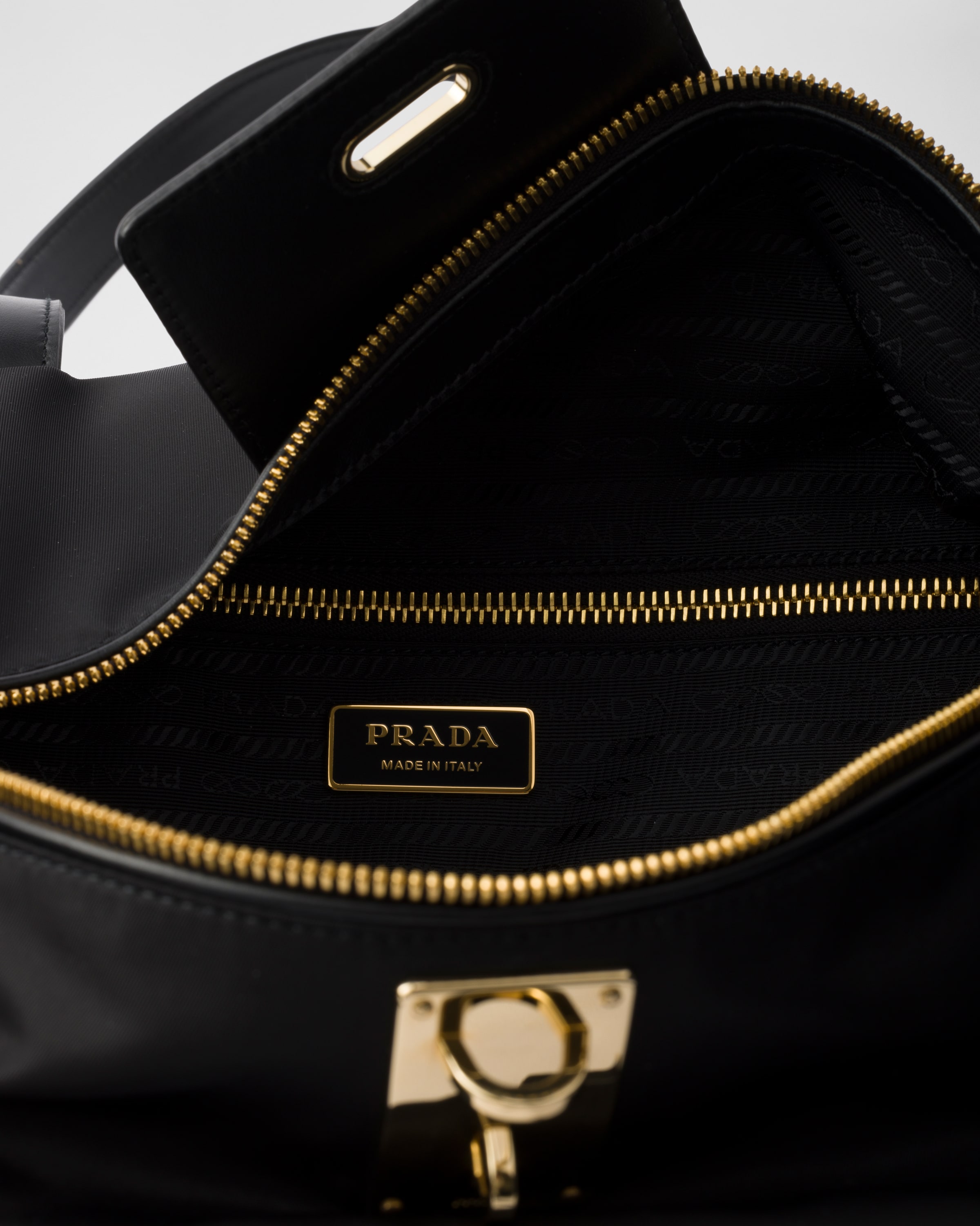 Shop Prada Large Re-nylon Top-handle Bag With Padlock In Black