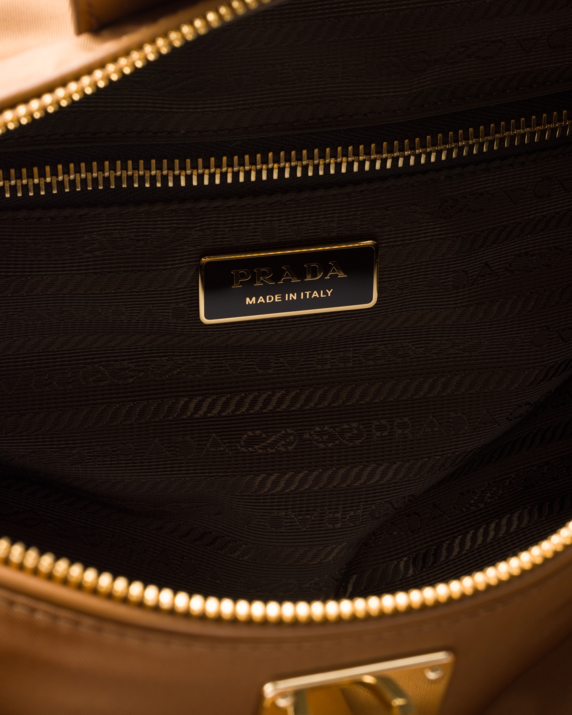 Shop Prada Large Re-nylon Top-handle Bag With Padlock In Brandy