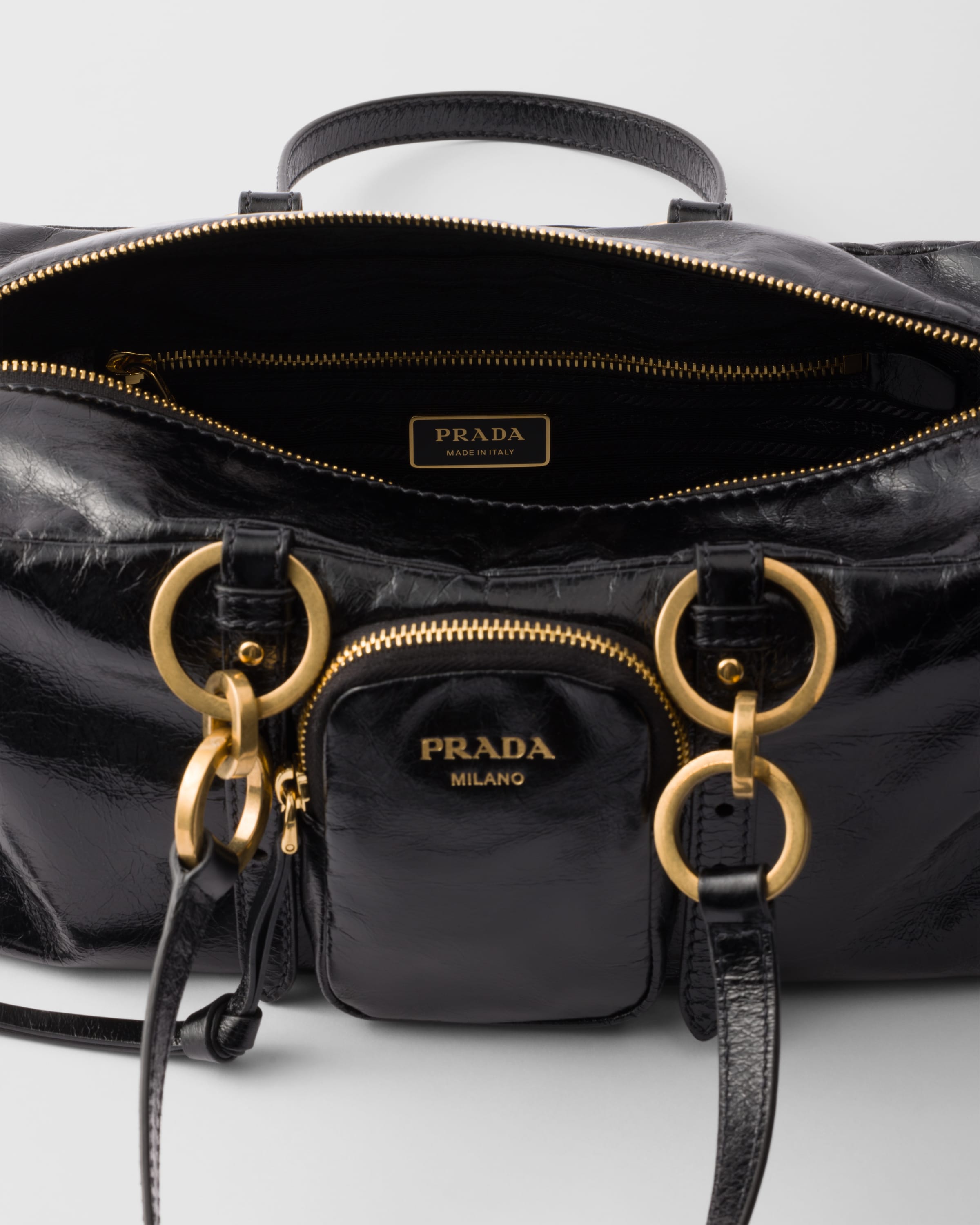 Prada Leather Handbag With Double Handles And Front Pocket In Black