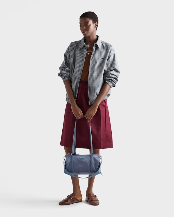 Large Re-Nylon and Saffiano leather duffel bag - Aviation Blue Large Re-Nylon and Saffiano leather duffel bag - Aviation Blue