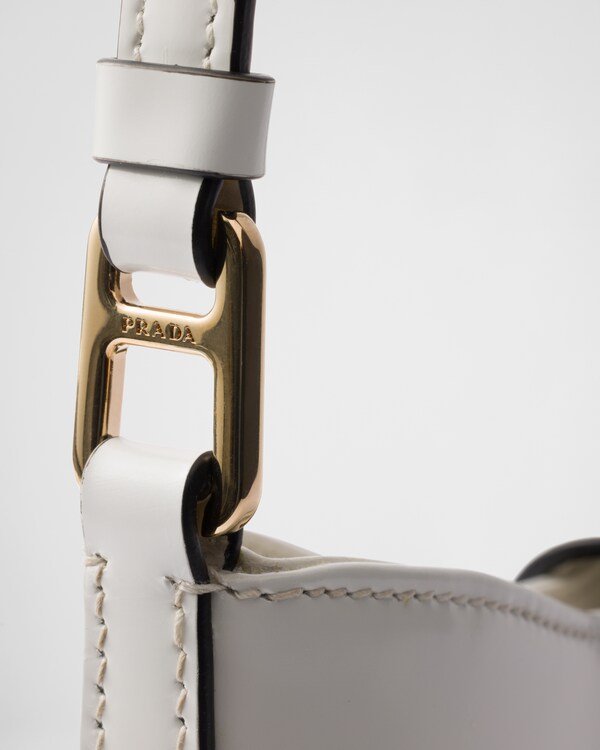 white-prada-cleo-brushed-leather-shoulder-bag-with-clasp-closure-prada