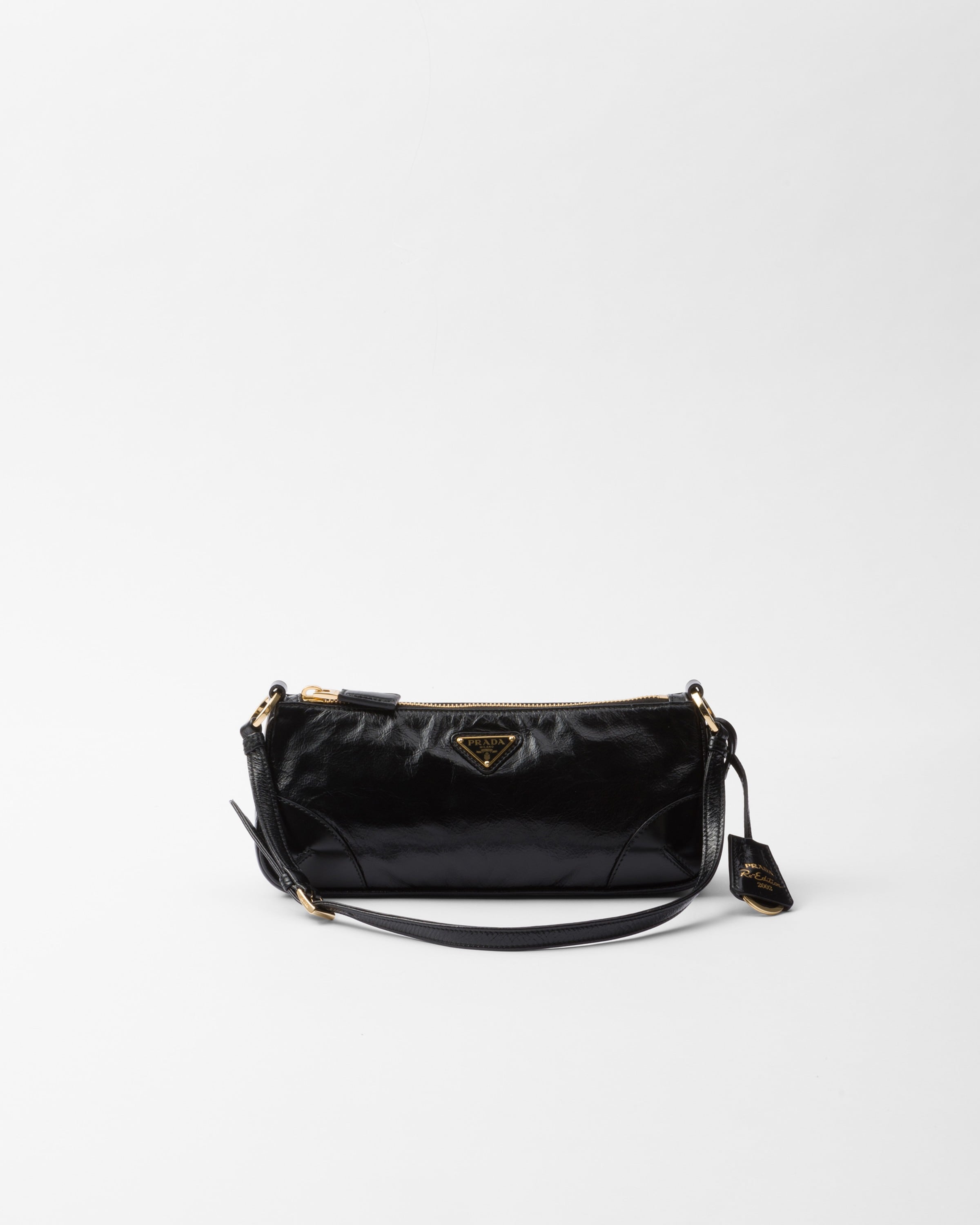 Prada Re-edition 2002 Small Leather Shoulder Bag In Black