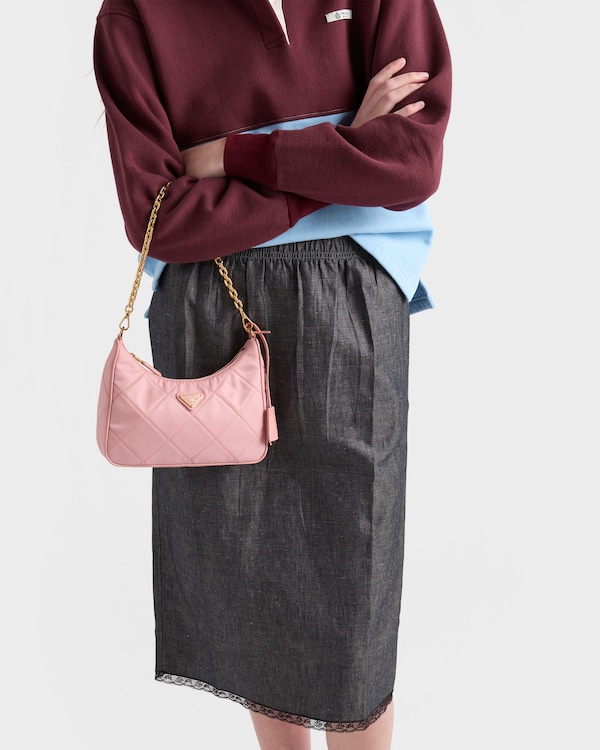 Prada Re-Edition quilted Re-Nylon mini-bag - Peach Prada Re-Edition quilted Re-Nylon mini-bag - Peach