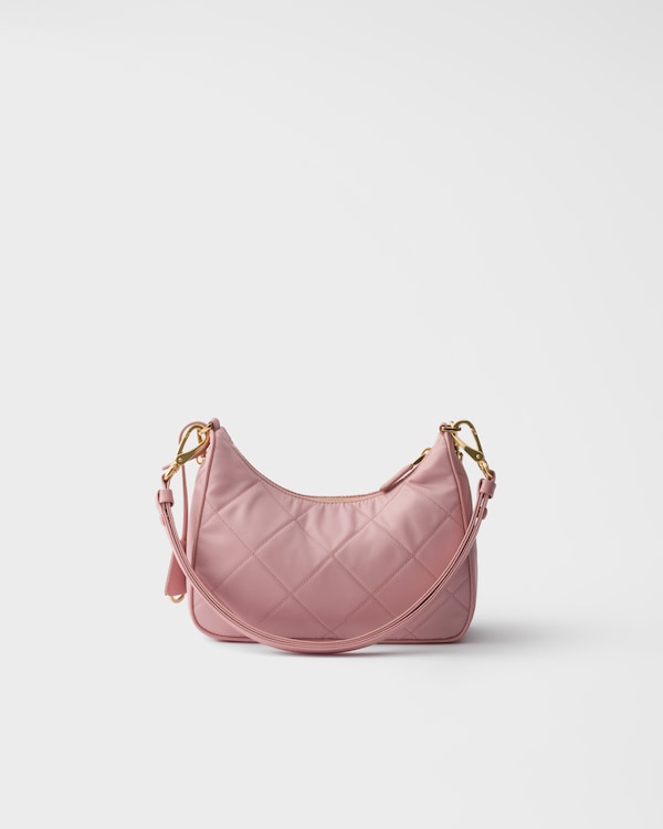 Prada Re-Edition quilted Re-Nylon mini-bag - Peach Prada Re-Edition quilted Re-Nylon mini-bag - Peach