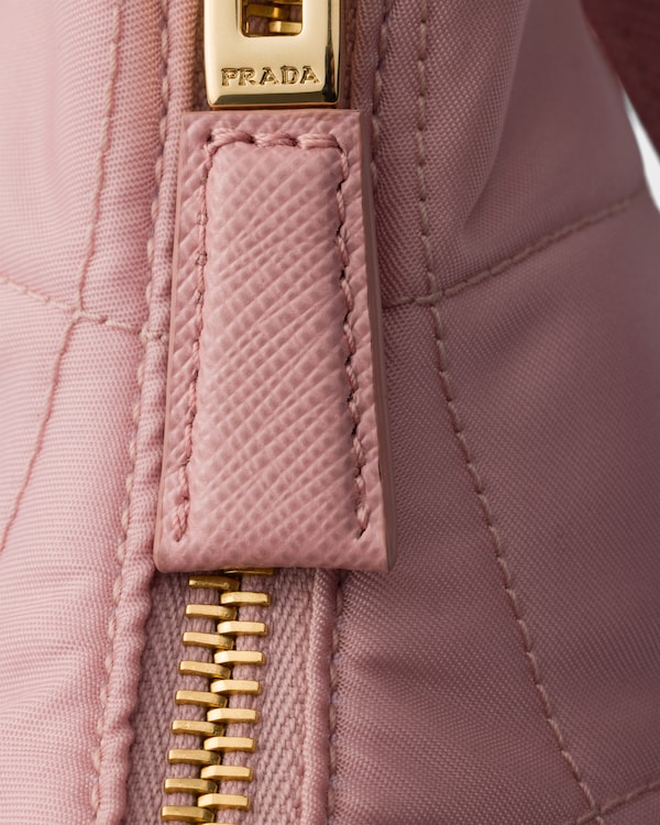 Prada Re-Edition quilted Re-Nylon mini-bag - Peach Prada Re-Edition quilted Re-Nylon mini-bag - Peach