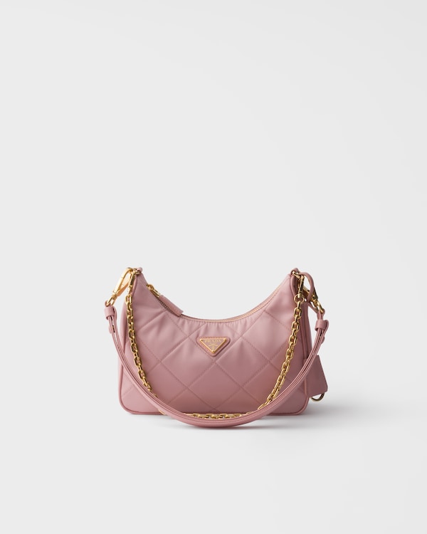 Prada Re-Edition quilted Re-Nylon mini-bag - Peach Prada Re-Edition quilted Re-Nylon mini-bag - Peach