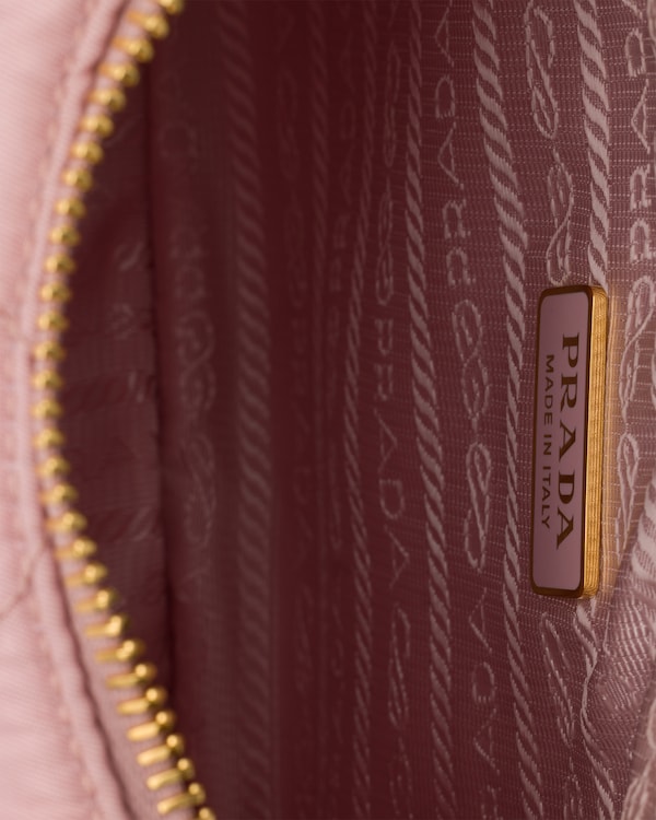 Prada Re-Edition quilted Re-Nylon mini-bag - Peach Prada Re-Edition quilted Re-Nylon mini-bag - Peach