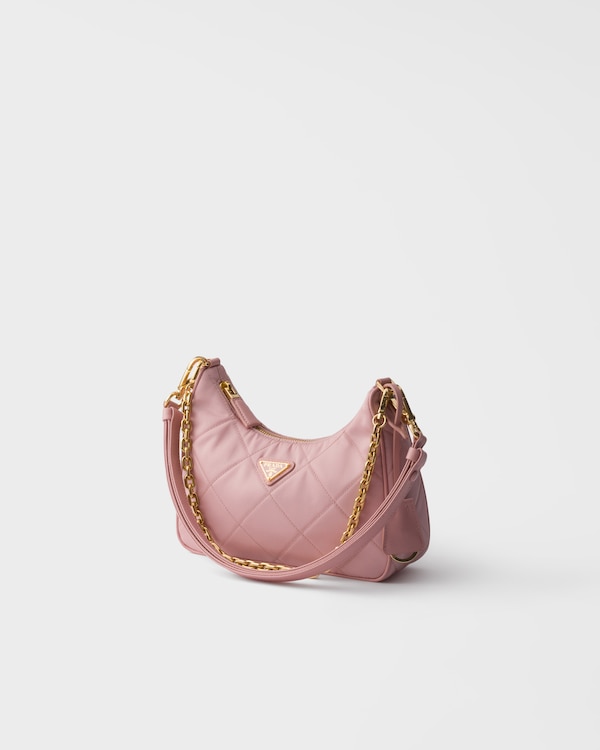 Prada Re-Edition quilted Re-Nylon mini-bag - Peach Prada Re-Edition quilted Re-Nylon mini-bag - Peach