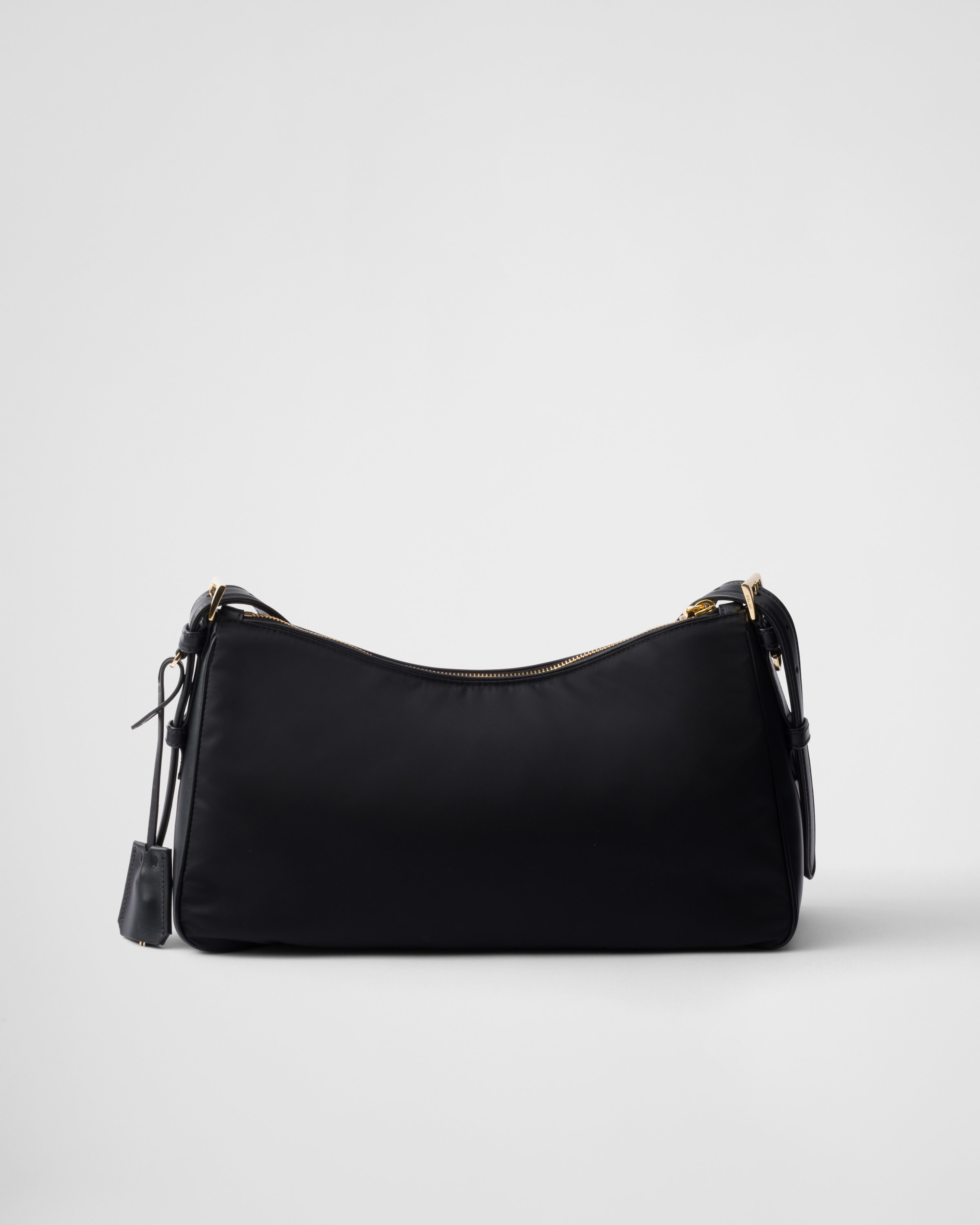 Shop Prada Aimée Large Re-nylon And Leather Shoulder Bag With Padlock In Black