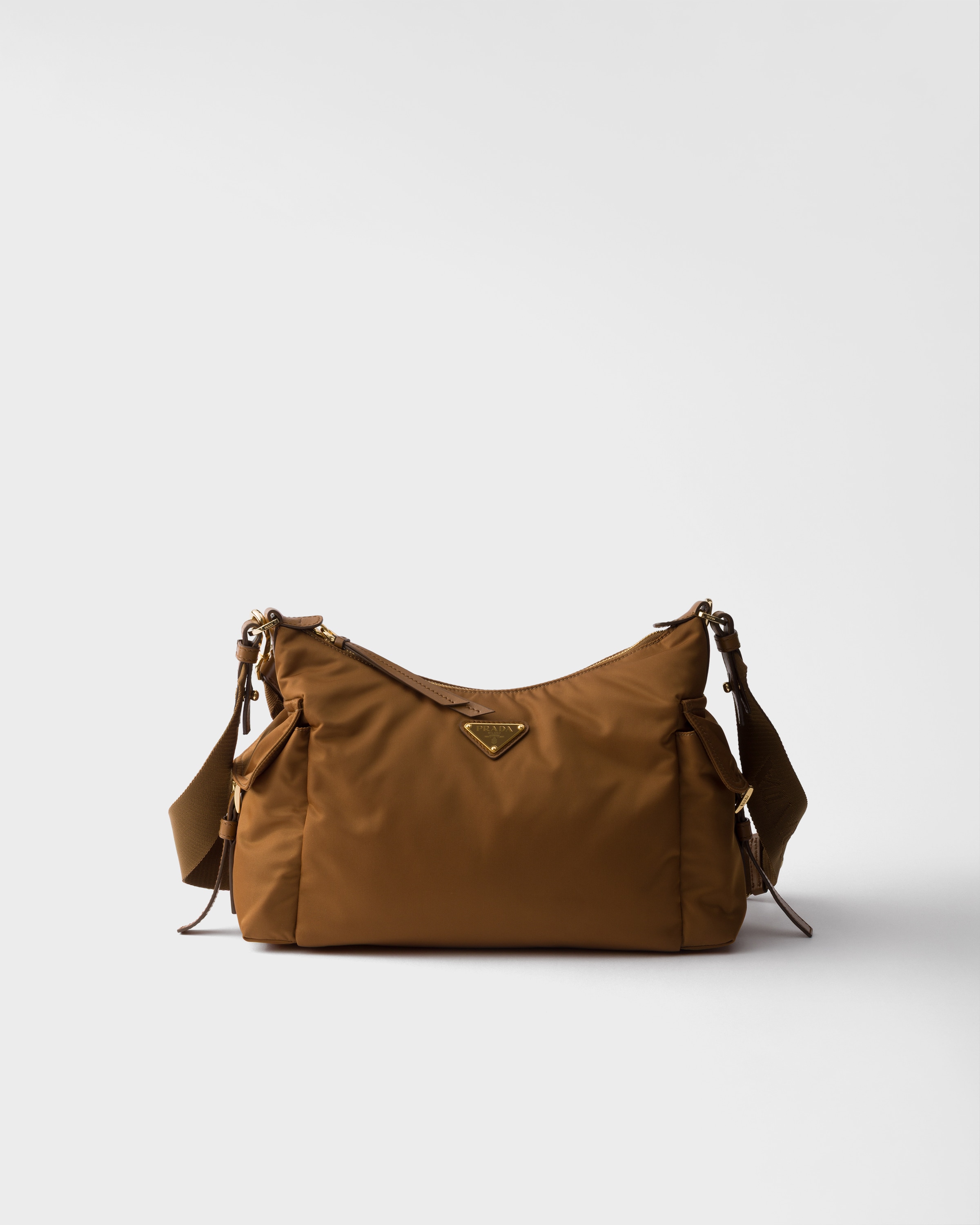 Prada Explore Large Re-nylon And Leather Bag In Brown