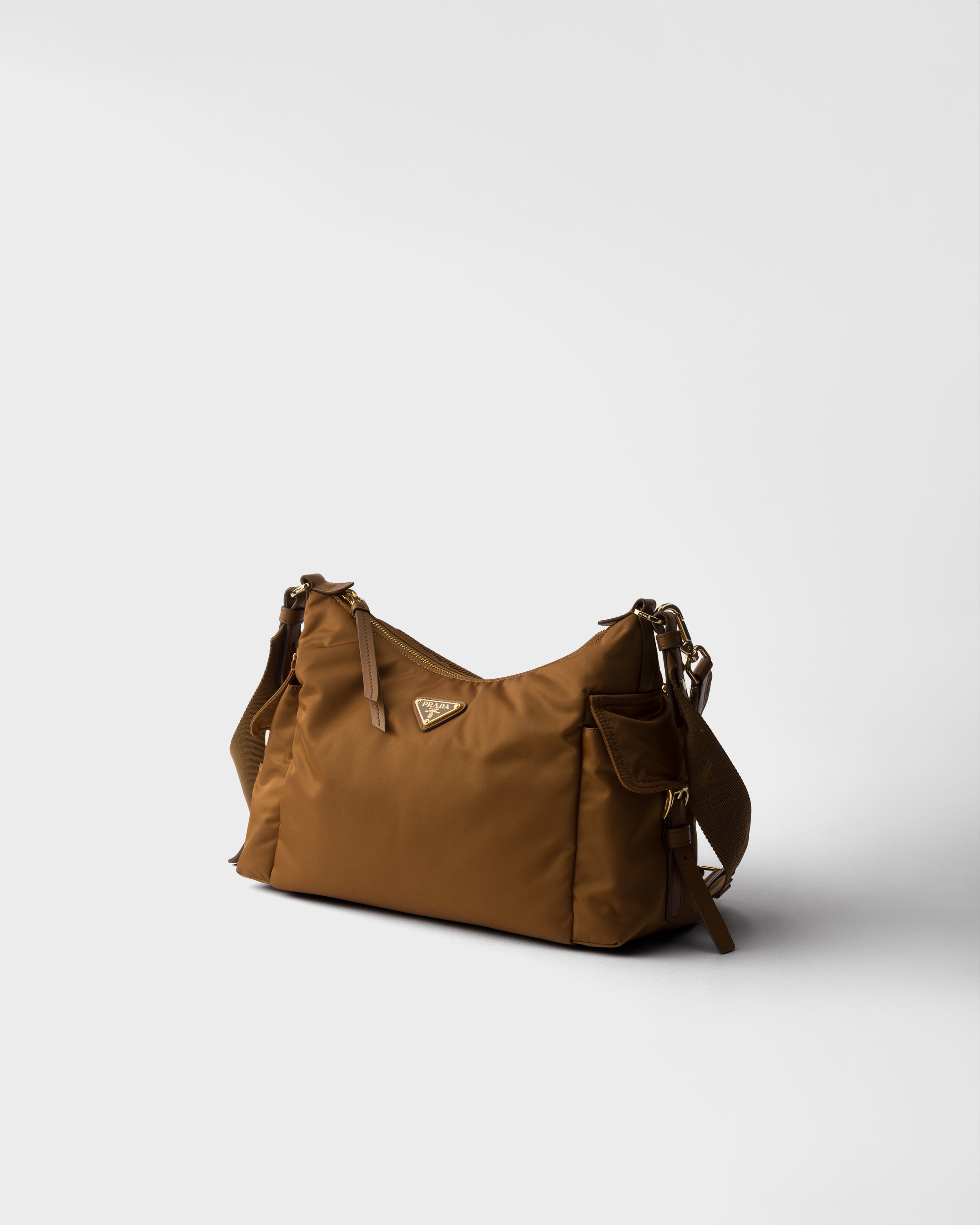 Prada Explore Large Re-nylon And Leather Bag In Brown