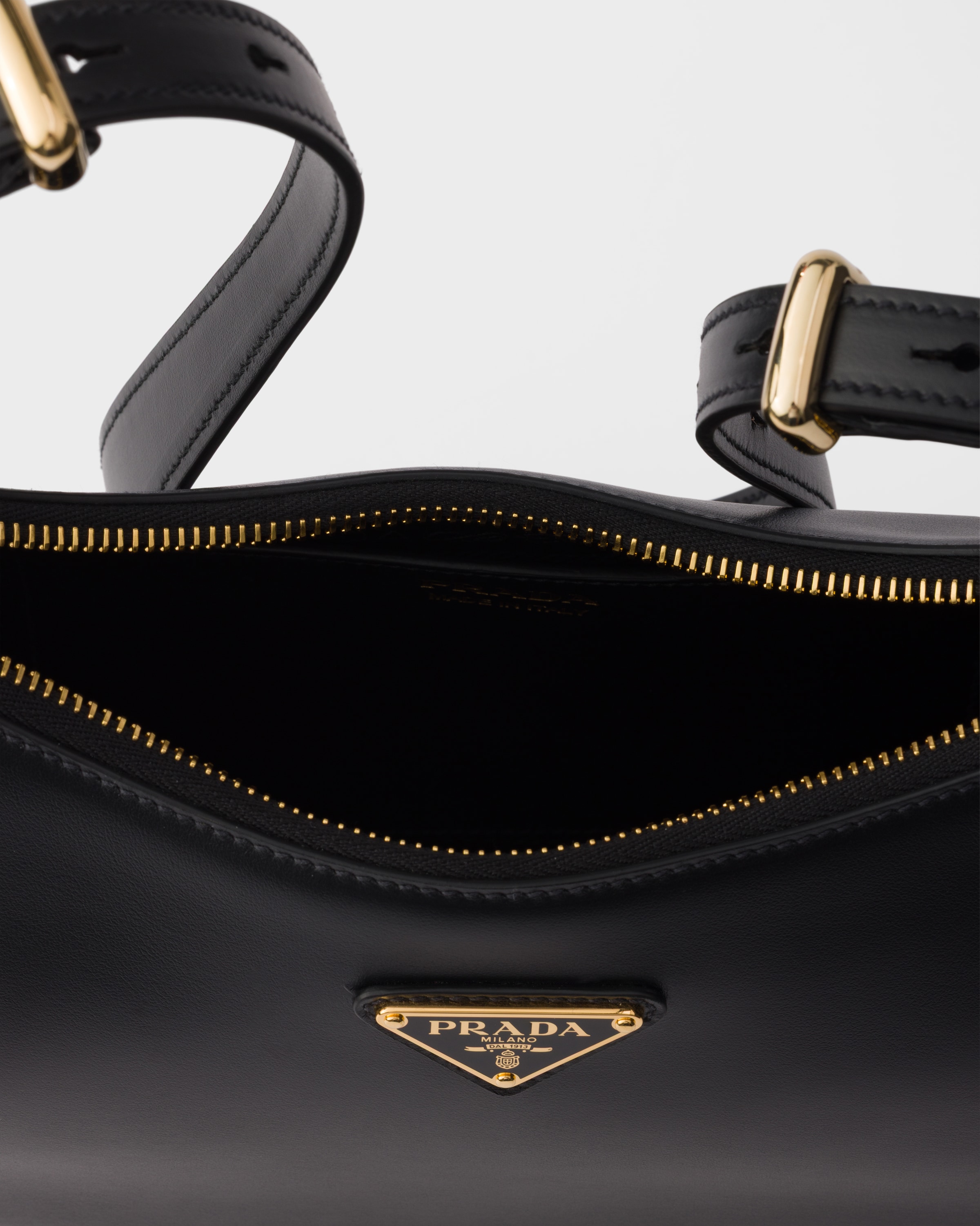 Black Prada Arqué small leather shoulder bag | PRADA - United States