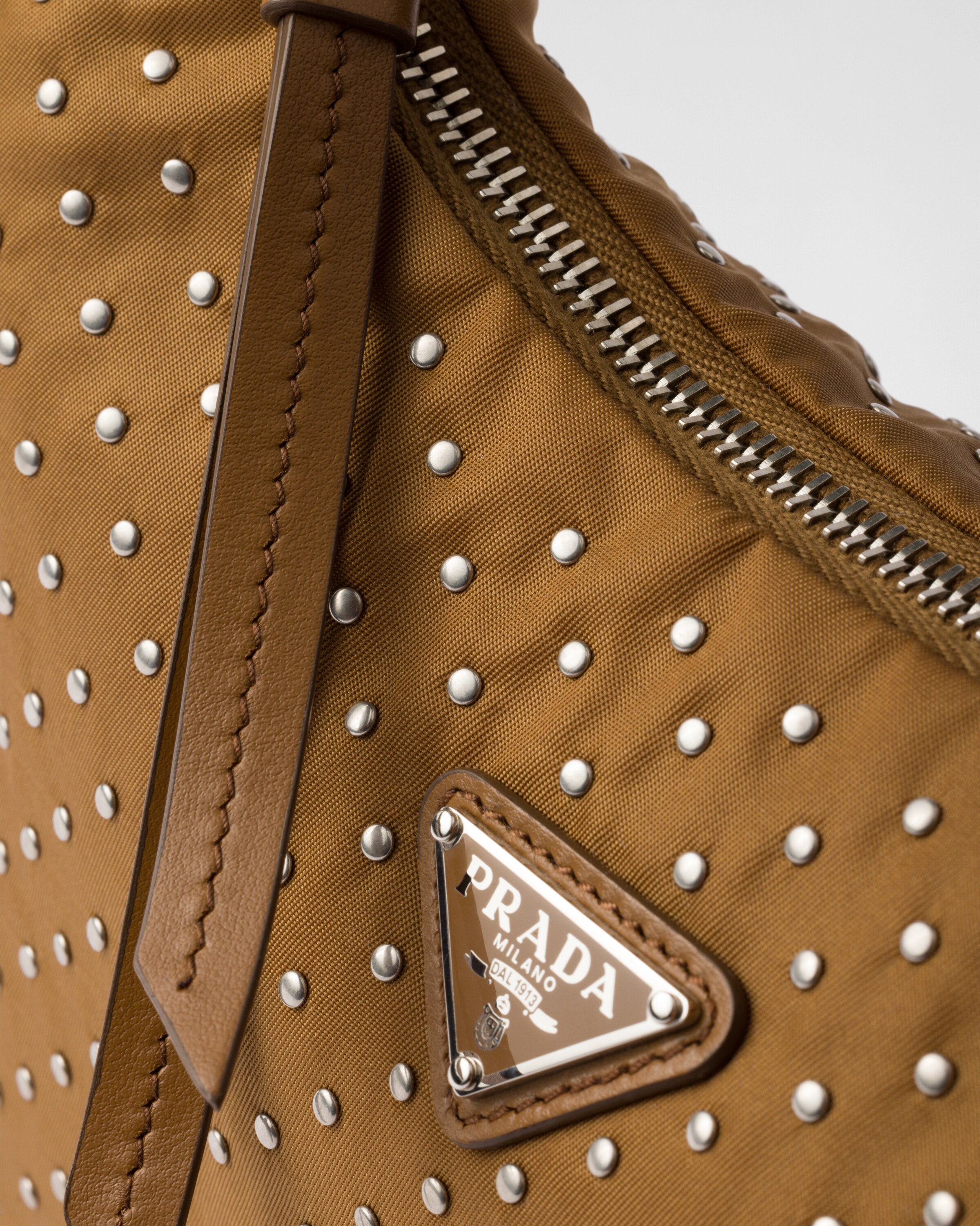 Brandy Prada Re-Edition Re-Nylon mini bag with studs | PRADA