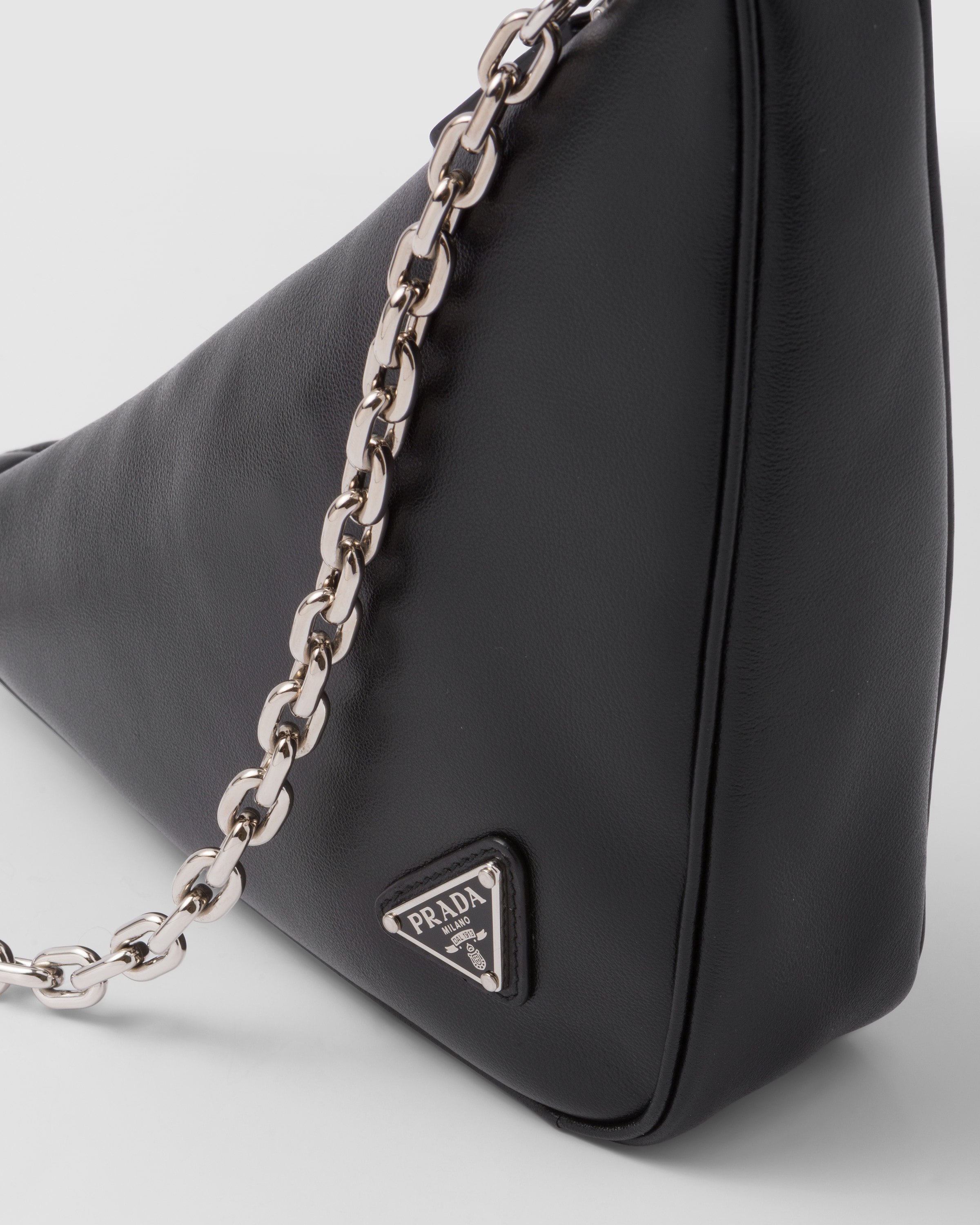 Black Triangle mini leather cross-body bag, Prada