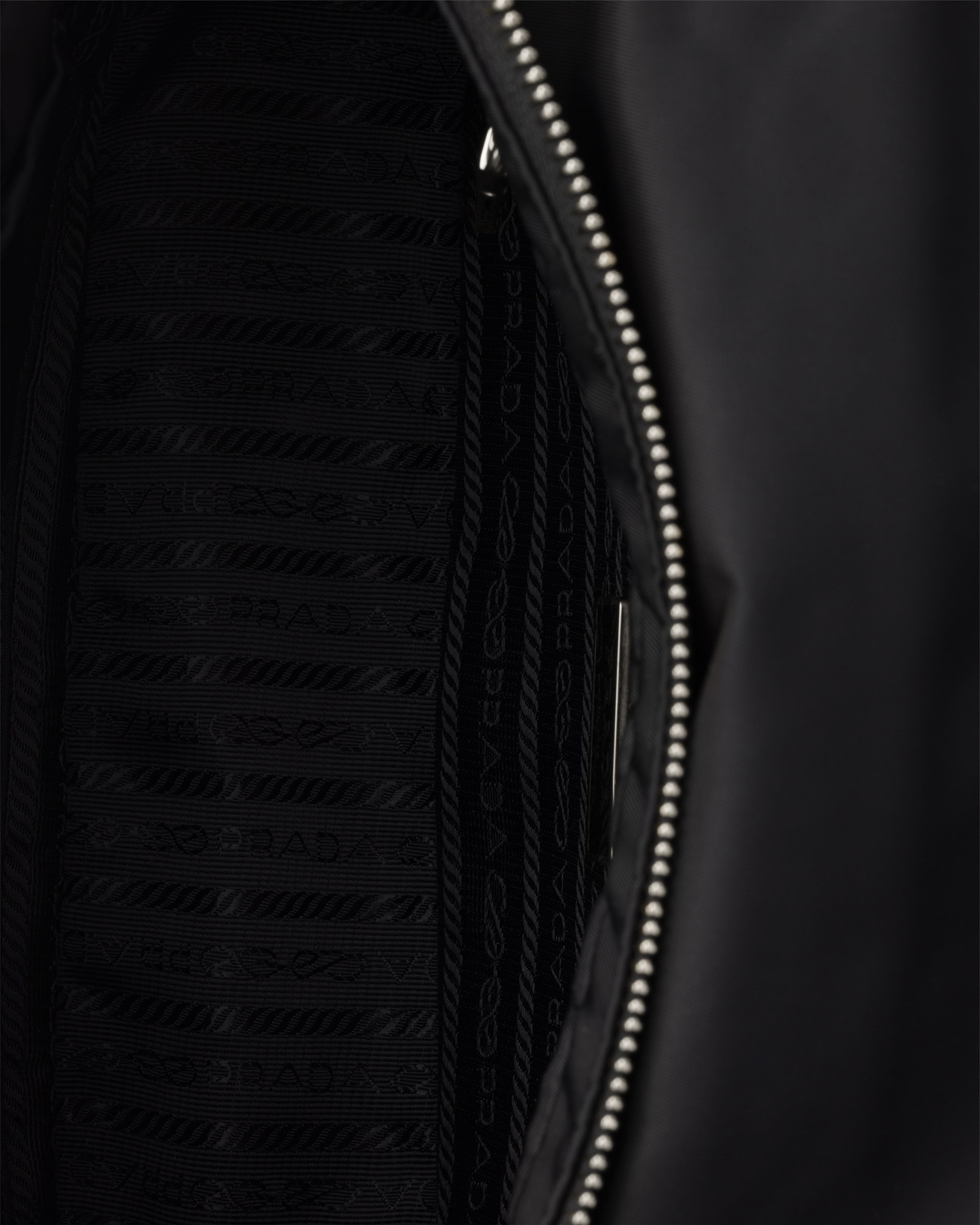 Prada Padded Re-nylon Shoulder Bag In Black