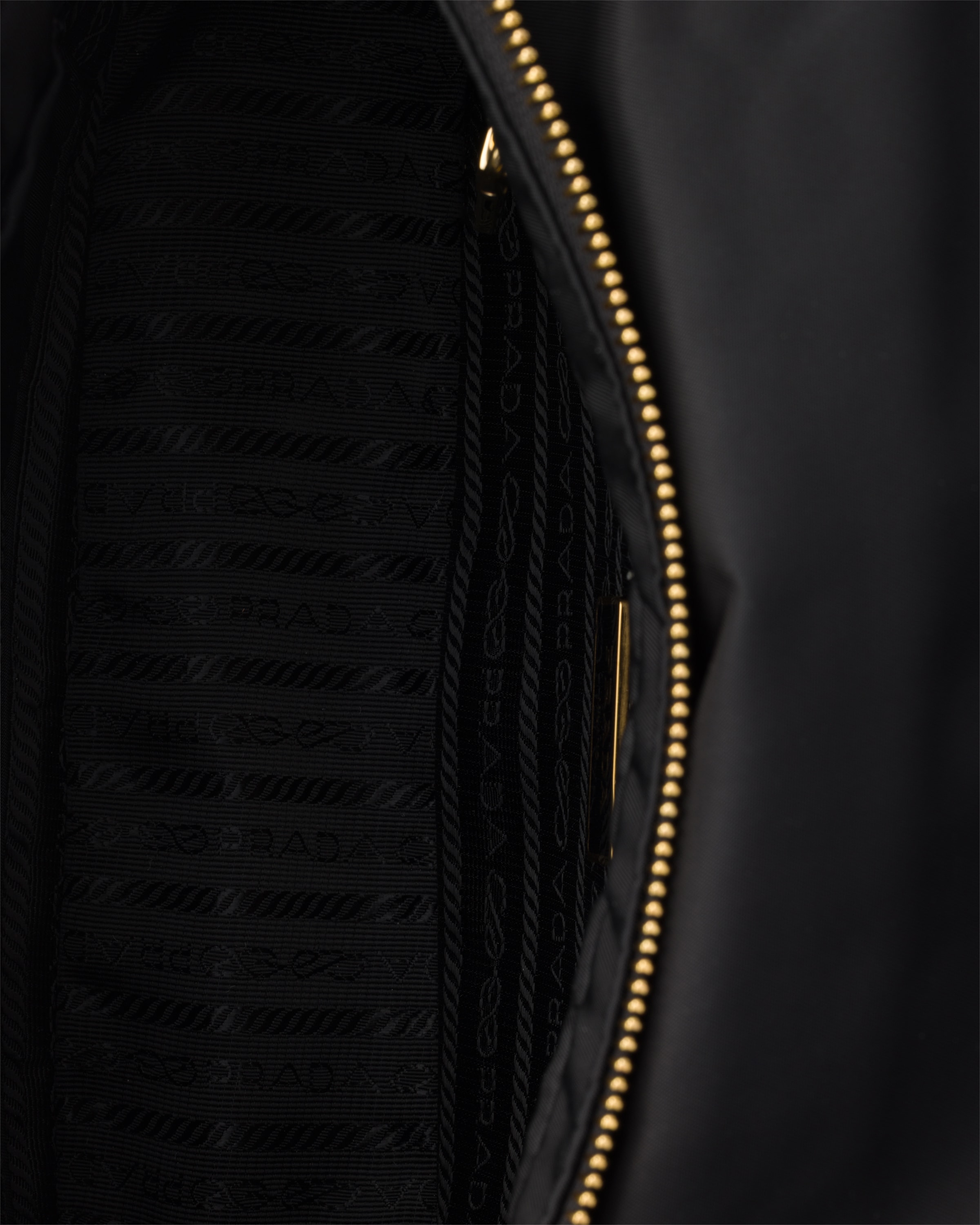 Prada Padded Re-nylon Shoulder Bag In Black