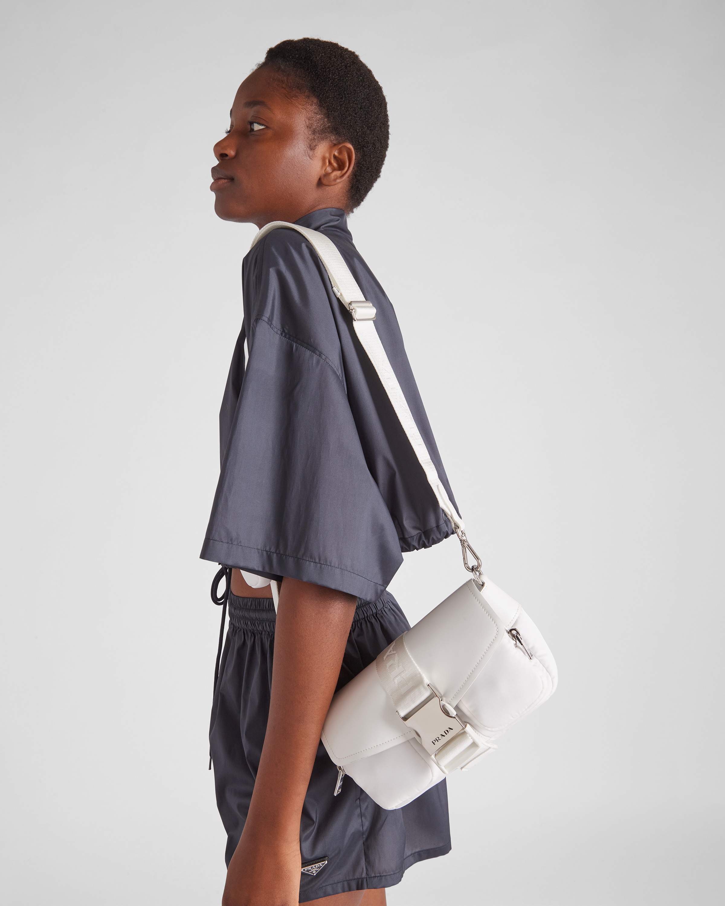 Prada pocket nylon and brushed leather bag best sale