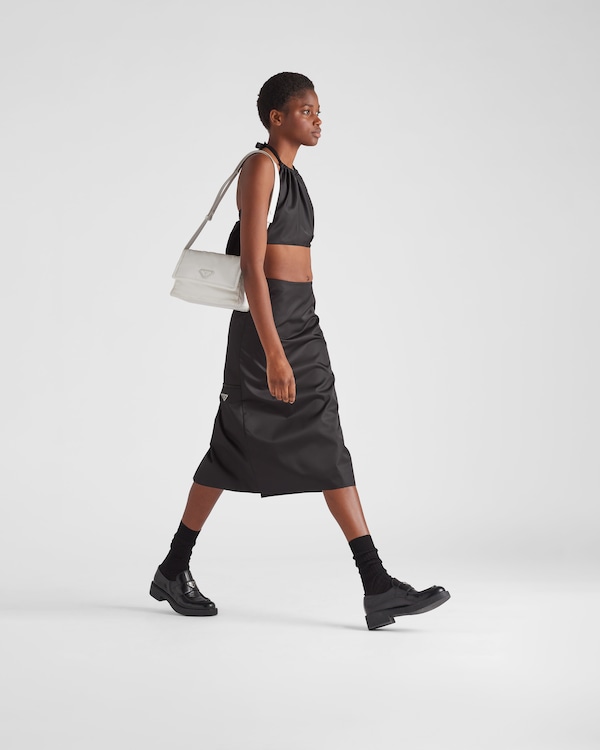 Petit sac porté épaule Prada Traveller en Re-Nylon matelassé Petit sac porté épaule Prada Traveller en Re-Nylon matelassé