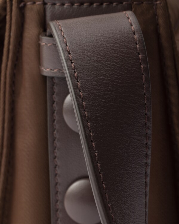 Prada Traveller small padded Re-Nylon shoulder bag - Sienna Prada Traveller small padded Re-Nylon shoulder bag - Sienna