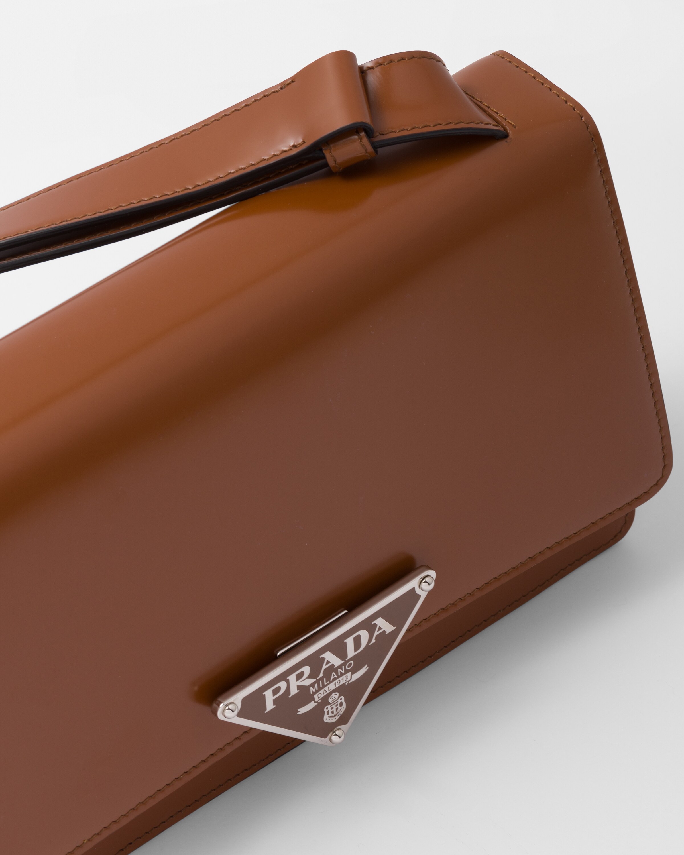 Tobacco Prada Emblème brushed-leather bag | Prada