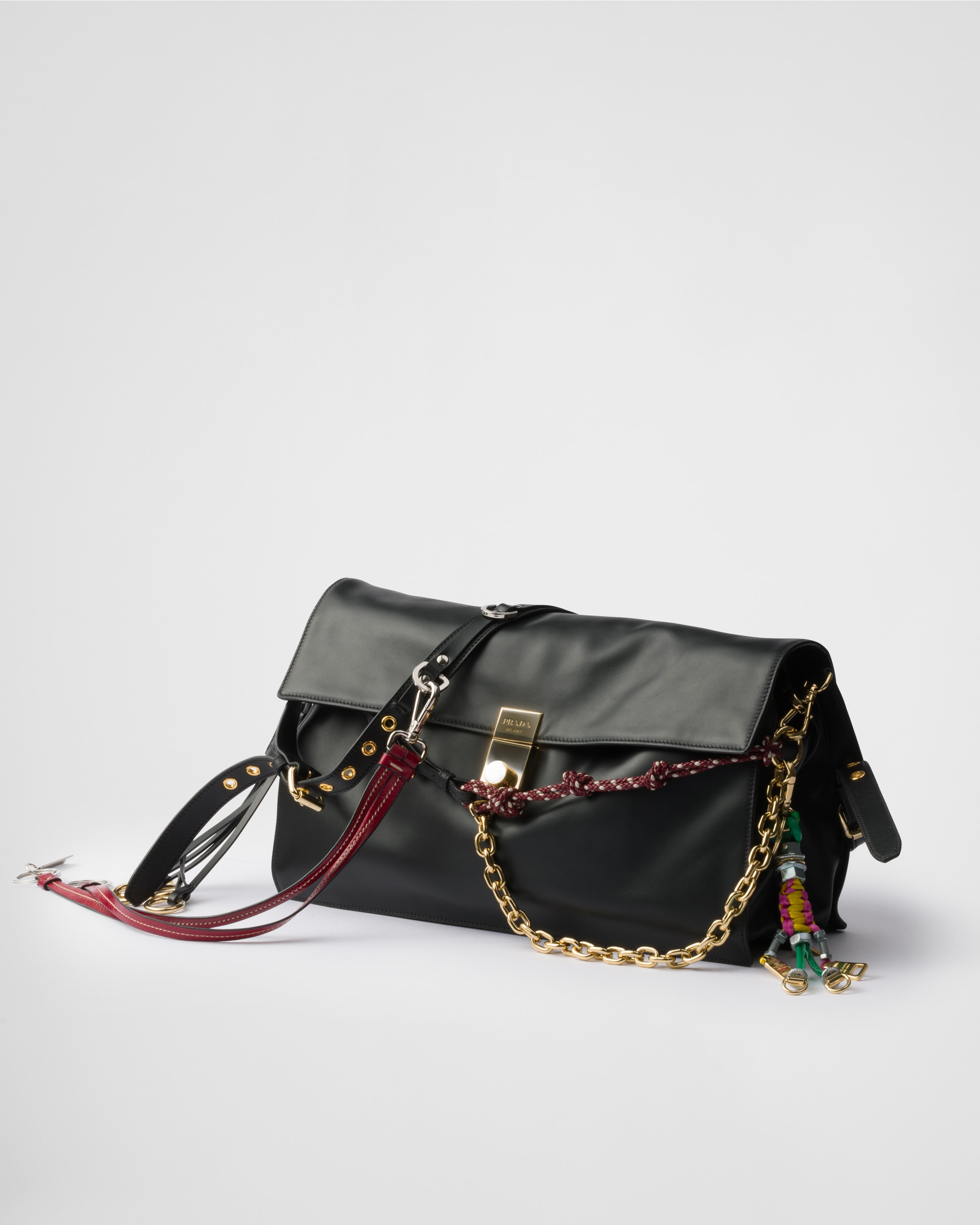 Prada Soft Sound Large Leather Shoulder Bag With Charms In Black