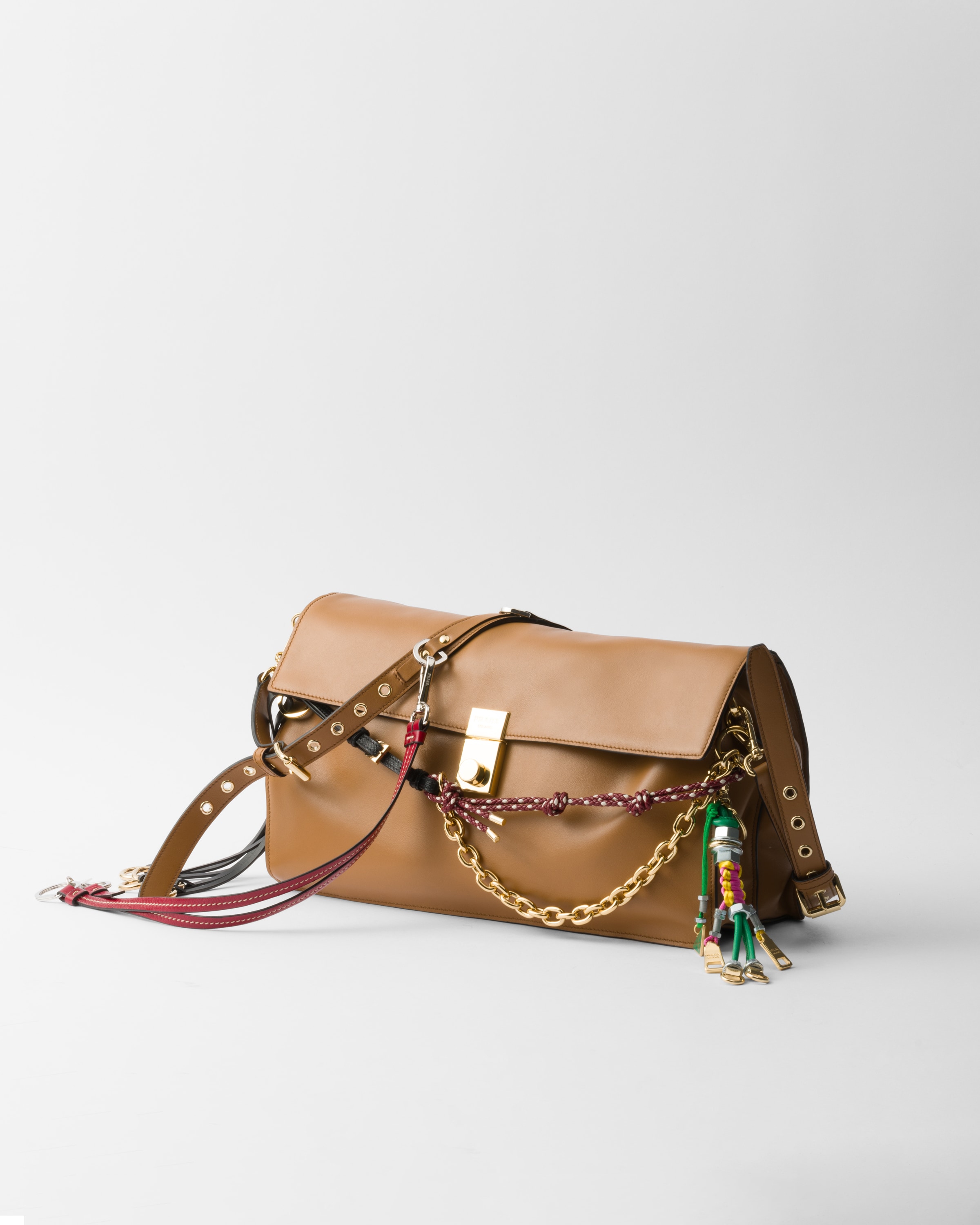 Prada Soft Sound Large Leather Shoulder Bag With Charms In Caramel