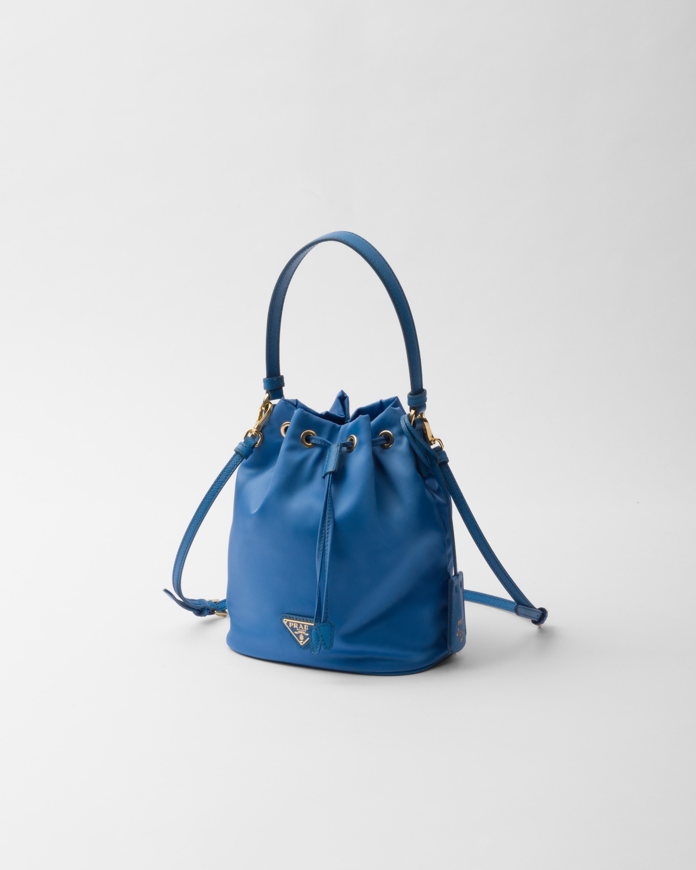 Prada Re-edition 1978 Re-nylon Mini Recycled-polyamide Bucket Bag In Light Blue