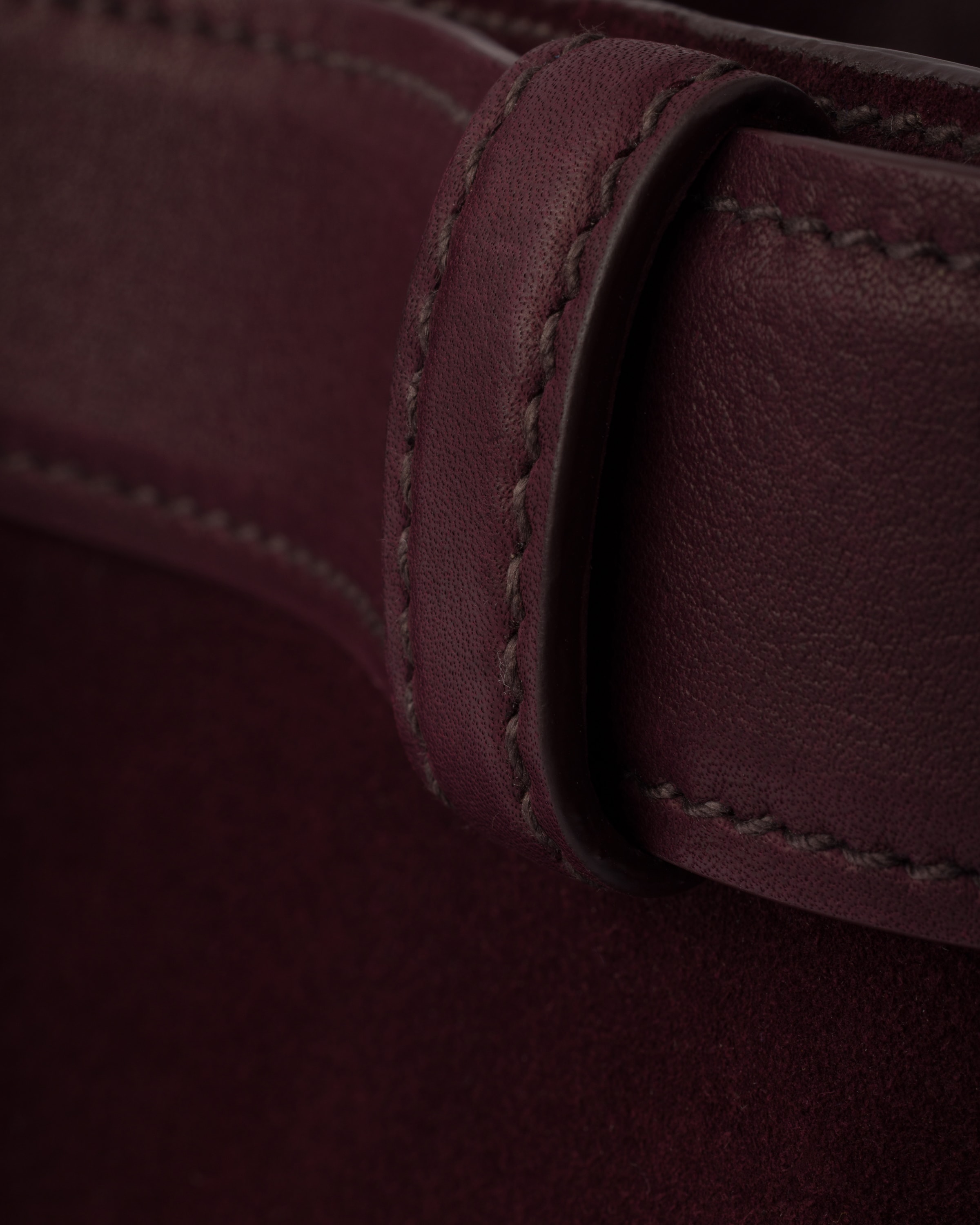 Prada Buckle belted suede bucket bag