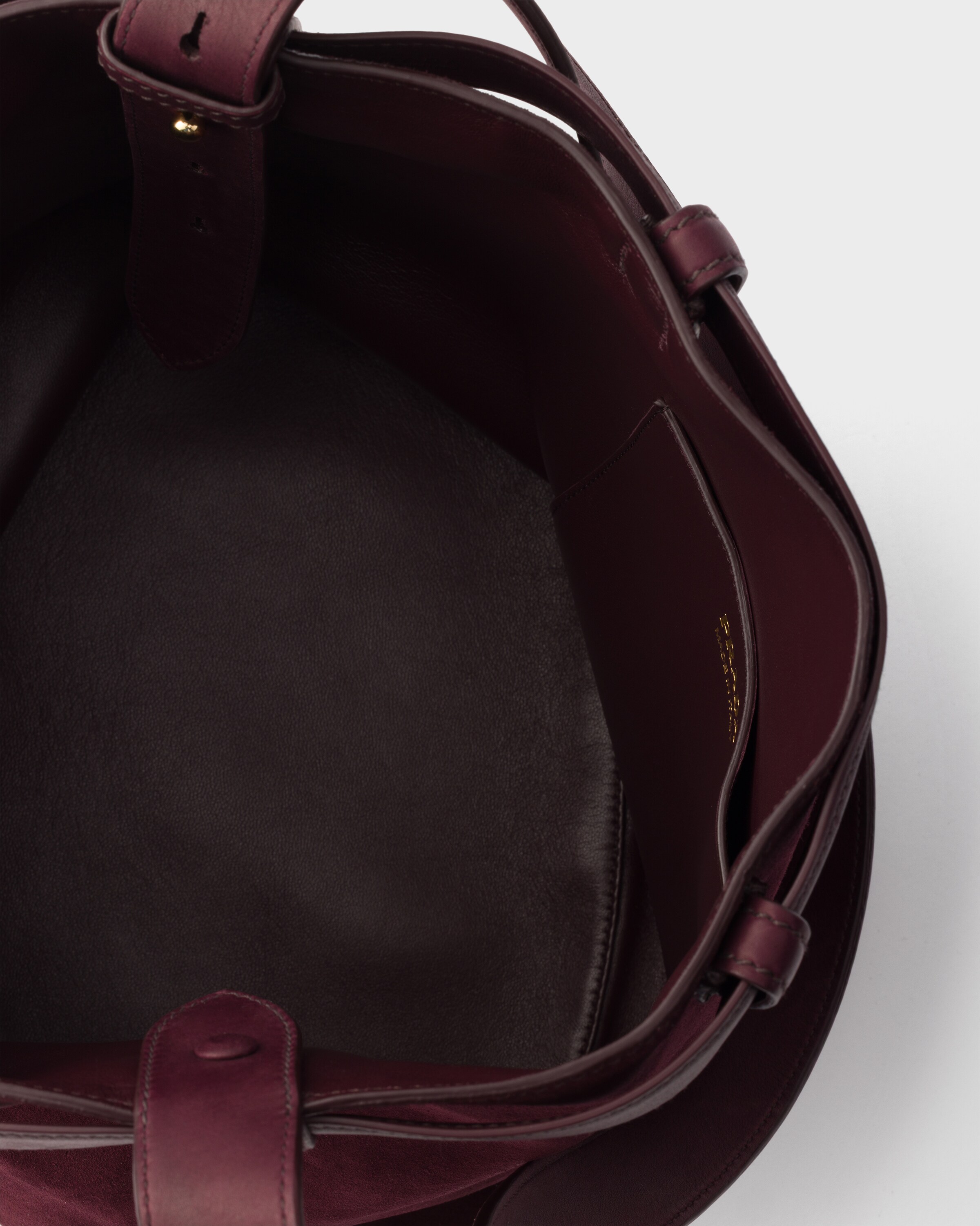 Prada Buckle belted suede bucket bag