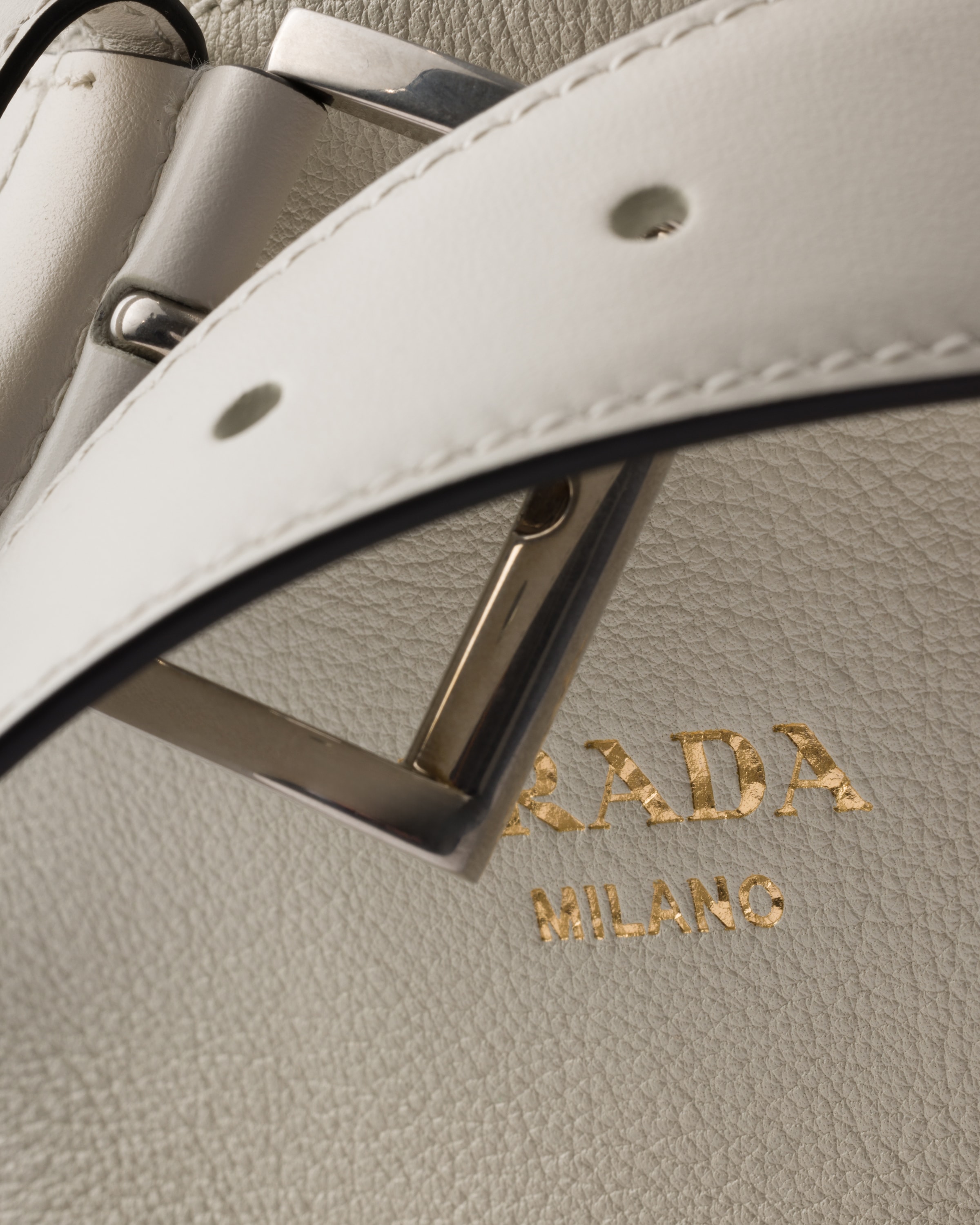 White/Black Prada Buckle leather bucket bag with belt | PRADA