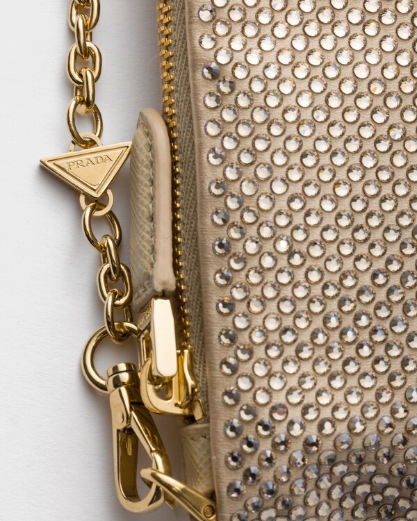 Minicartera de mano con bandolera y cristales Minicartera de mano con bandolera y cristales