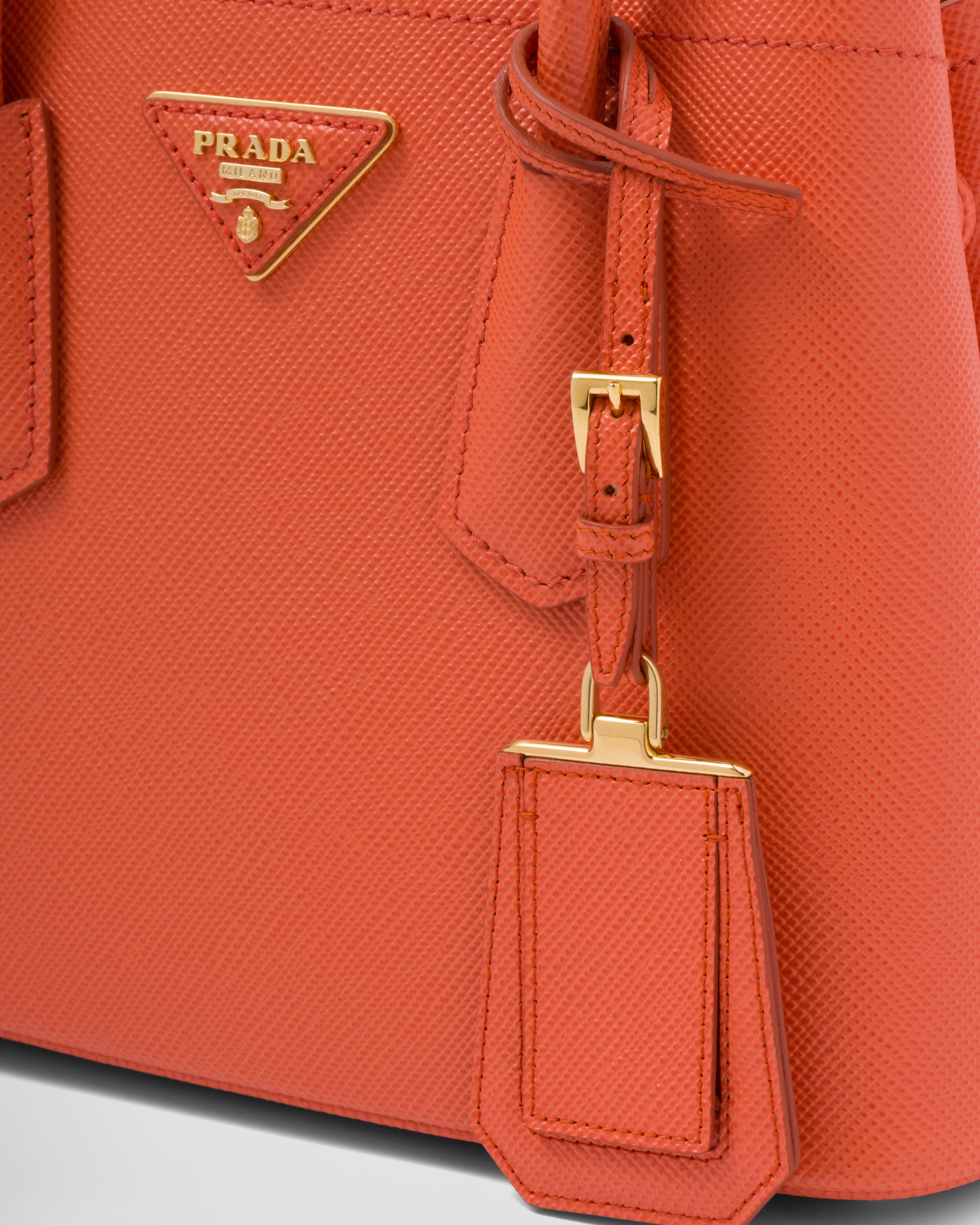 Prada discount orange clutch