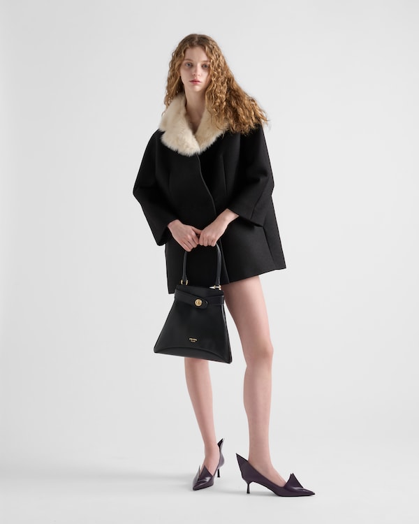 Bolsa tote Prada Carey média em couro Bolsa tote Prada Carey média em couro