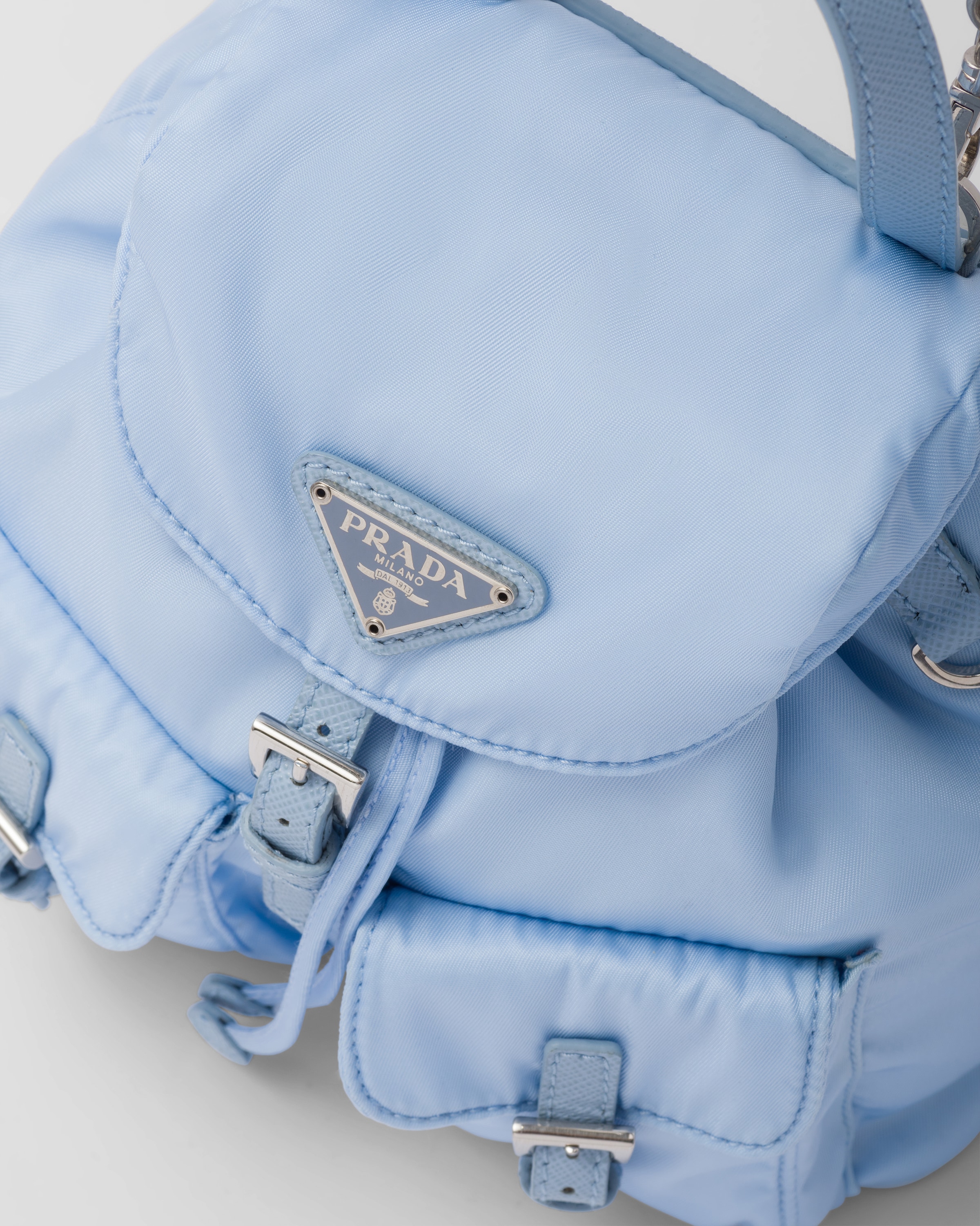 Prada blue backpack sales