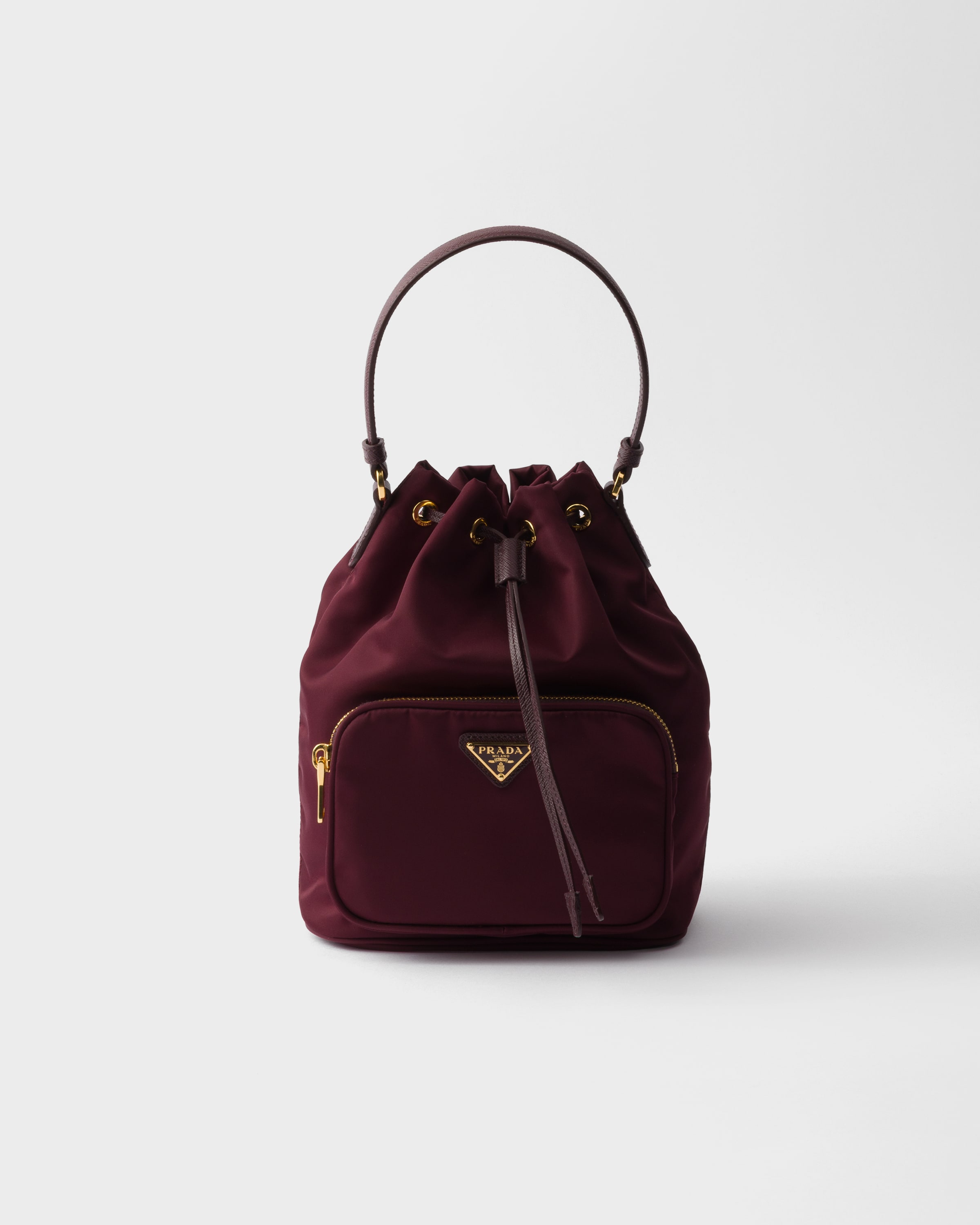 Prada Duet Re-nylon Bucket Bag In Burgundy
