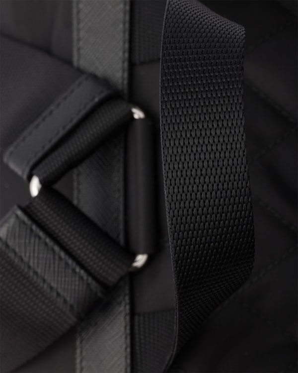 Medium quilted Re-Nylon backpack with Saffiano leather trim - Black Medium quilted Re-Nylon backpack with Saffiano leather trim - Black