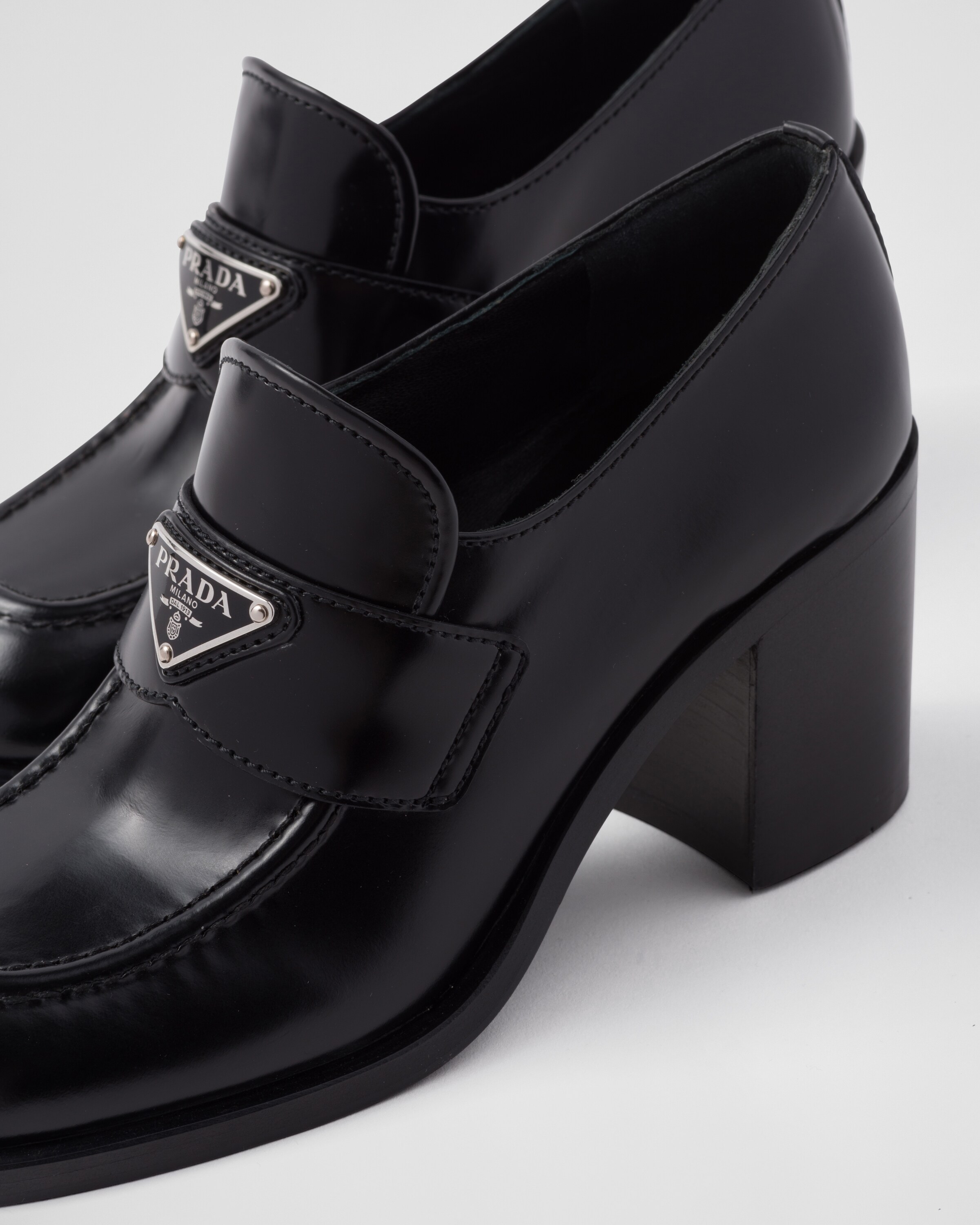 Prada heeled loafers shop