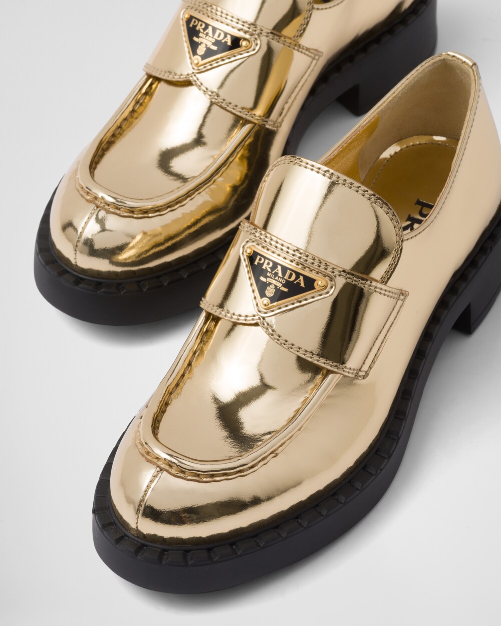 Platinum Metallic leather loafers | Prada