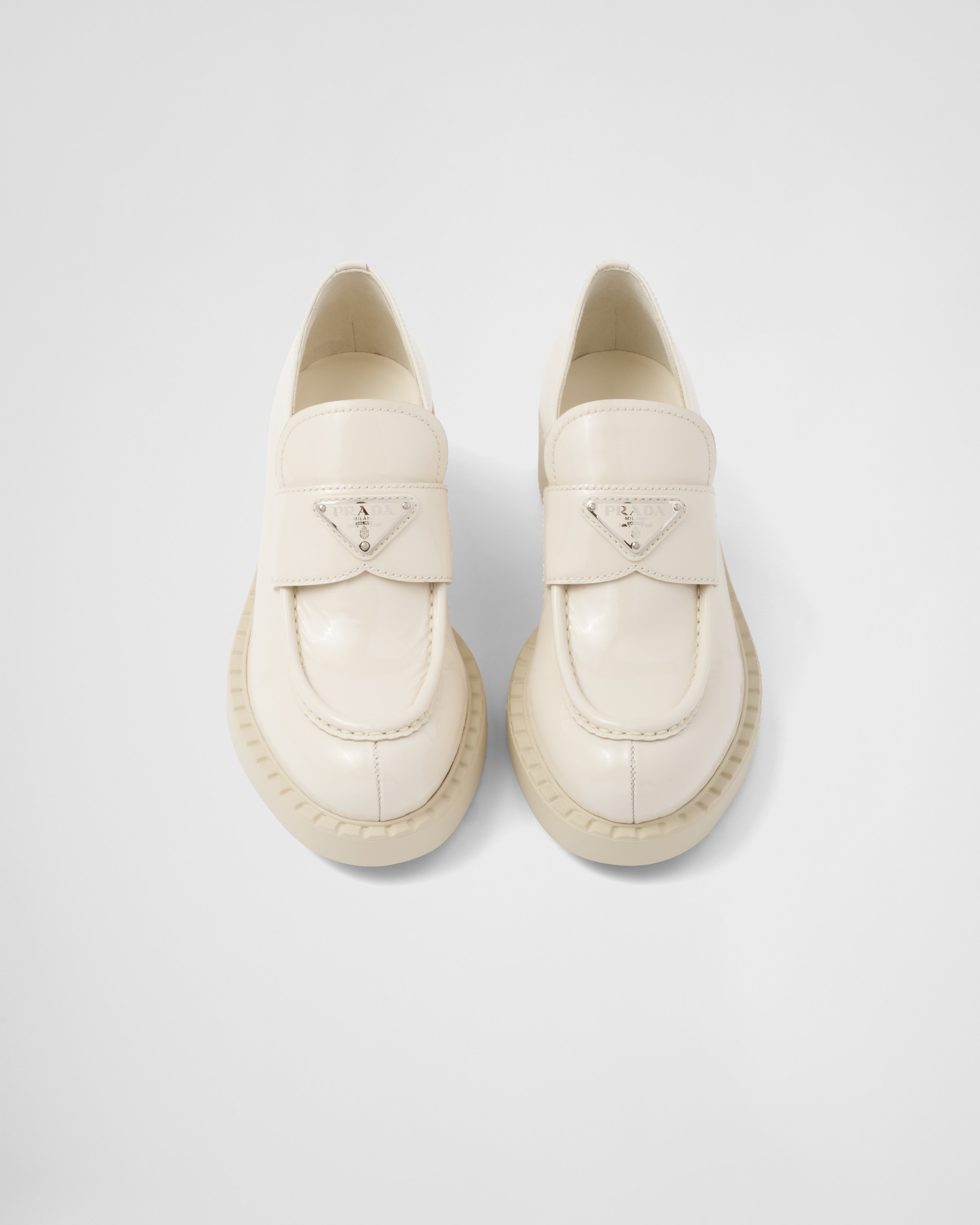 Ivory Chocolate patent leather loafers Prada