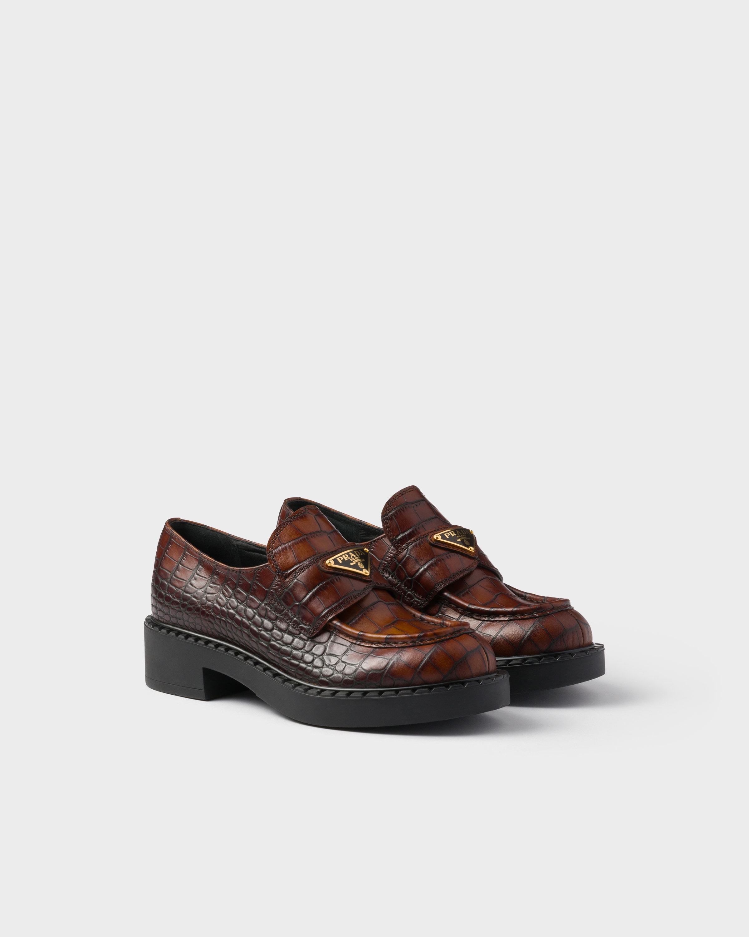 Chocolate crocodile-print leather loafers